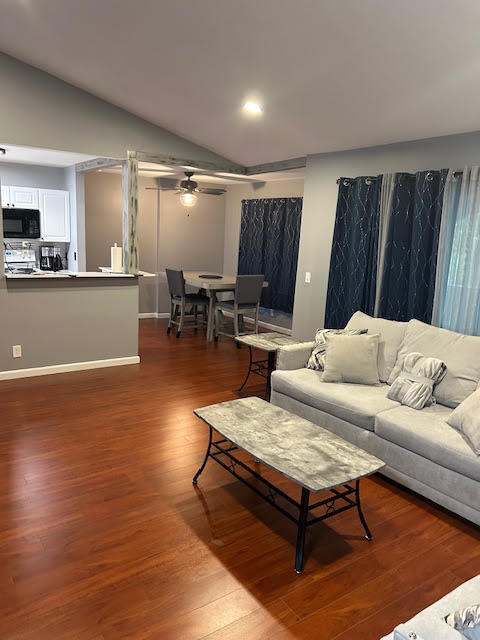 Beautifully updated and offered fully furnished (excluding patio furniture), this turnkey 2-bedroom, 2-bath 2nd-floor condo features an open floor plan with soaring vaulted ceilings and abundant natural light. A standout feature is the full impact windows, providing storm protection, energy efficiency, enhanced security, and peace of mind. The kitchen offers quartz countertops, updated lighting, and flows into the spacious living area. New interior doors and an in-unit washer and dryer add convenience. Relax on the large screened balcony with a private, peaceful view. Community amenities include a pool and fitness center. Rent immediately after purchase, making this a great investment or full-time residence. Ideally located near I-95, beaches, shopping, and restaurants.  Buyer pays application fee $150 processing fee $100 transfer fee $250 resale fee $250 estoppel fee $299