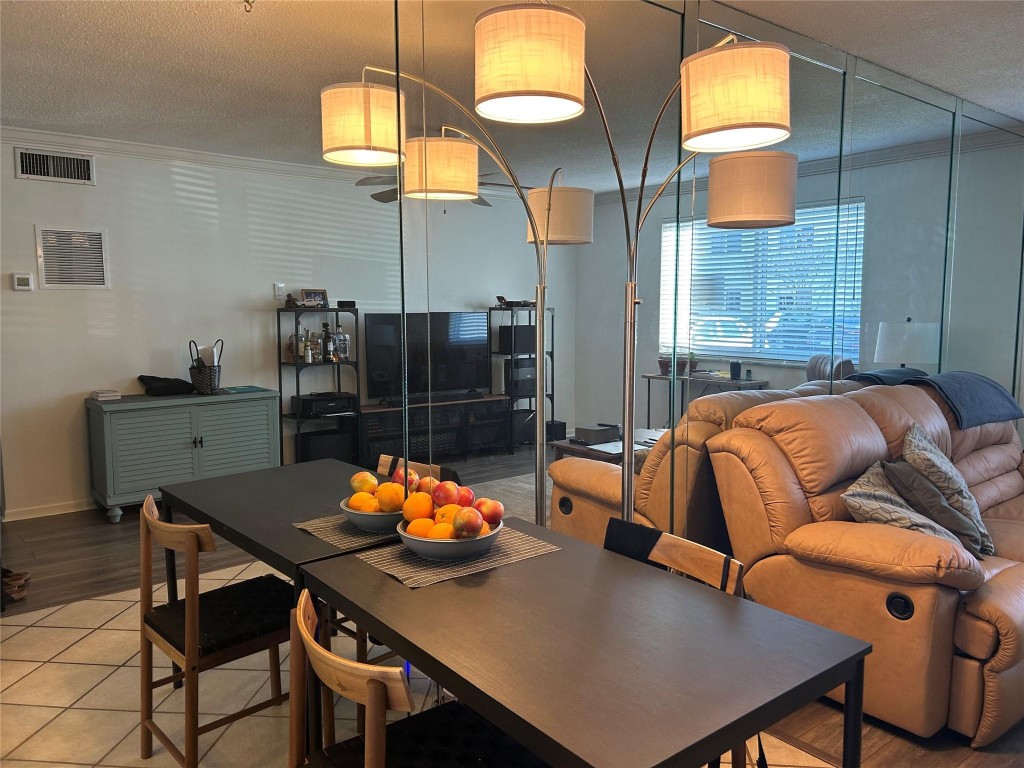 Beautiful Condition in this first floor home in Imperial Point !  New IMPACT WINDOWS, NEW ROOF, NEW AC ! Vinyl floors create a modern look! Blinds have been replaced, Bathroom Shower redone, and countertops replaced ! Come and take a look soon !