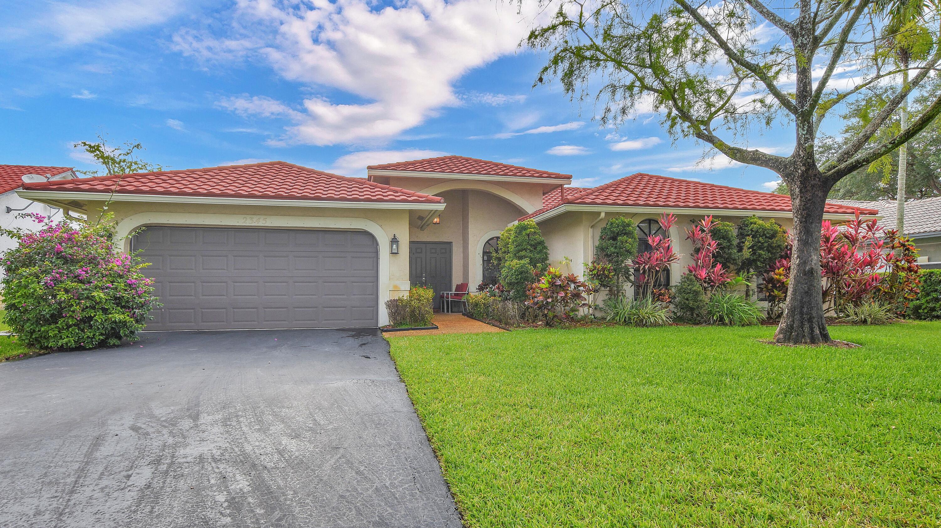 Beautiful  4BR/2BA home with soaring ceilings and approx. 2181 sqft of vibrant, welcoming living space. Fresh interior paint, new wood look vinyl flooring in kitchen/bedrooms, NO CARPET. Newer kitchen appliances, washer/dryer, water heater, AC, and a durable 2006 metal roof. Enjoy a huge screened patio with jacuzzi perfect for unforgettable gatherings. Prime cul de sac location near downtown, restaurants, movies, mall, community pool, and dog park. Great school district. Assumable 2.125% rate on approx. $258K.