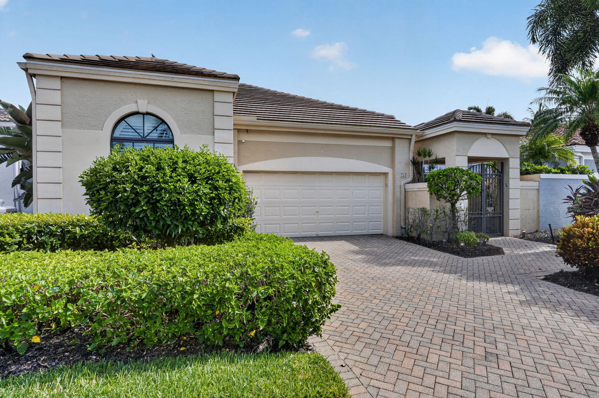 Welcome to this thoughtfully designed three-bedroom, three-bathroom residence nestled in the Ballenisles community of Palm Beach Gardens, Florida. This single-story home offers 2,165 square feet of finished living space, providing comfortable room for both everyday living and entertaining. The three full bathrooms ensure convenience for all residents, while the two-car garage provides secure parking and storage solutions. Located in the desirable Ballenisles subdivision, this property presents an excellent opportunity to own a well-appointed residence in a established Palm Beach Gardens community. Beautiful golf & water views. Exceptional landscaping with  tropical plantings. Full house generator and new hurricane windows. Light , bright home. Large paver stone patio overlooking lake & golf course.  Electric awning on patio.Short walk to neighborhood pool, main clubhouse, resort pool, fitness, tennis bocce & more. Great for biking.2 dog parks, large dogs & small dogs. Beautiful fitness trail, & playground. Card rooms, art studio, & numerous clubs within the club are available.