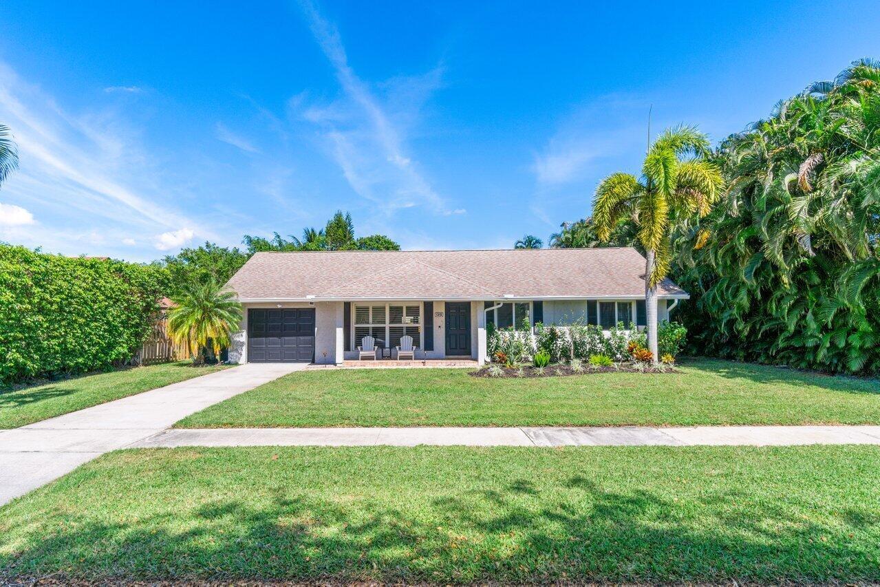 Your tropical oasis awaits in this three-bedroom, two-bathroom single-family home with a functional single-story layout and open floor plan. Features include complete hurricane-impact windows, a private pool, indoor and outdoor bars, and a fenced backyard with an oversized covered patio, offering plenty of space for outdoor dining and entertaining.  Located in the Tropic Palms community east of I-95 with no HOA. Zoned for Boca Raton Community High School. Conveniently located near Delray Beach, Atlantic Avenue, beaches, Mizner Park, restaurants, shopping, and other local amenities. This property may be suitable as a primary residence, seasonal home, or investment property where permitted!