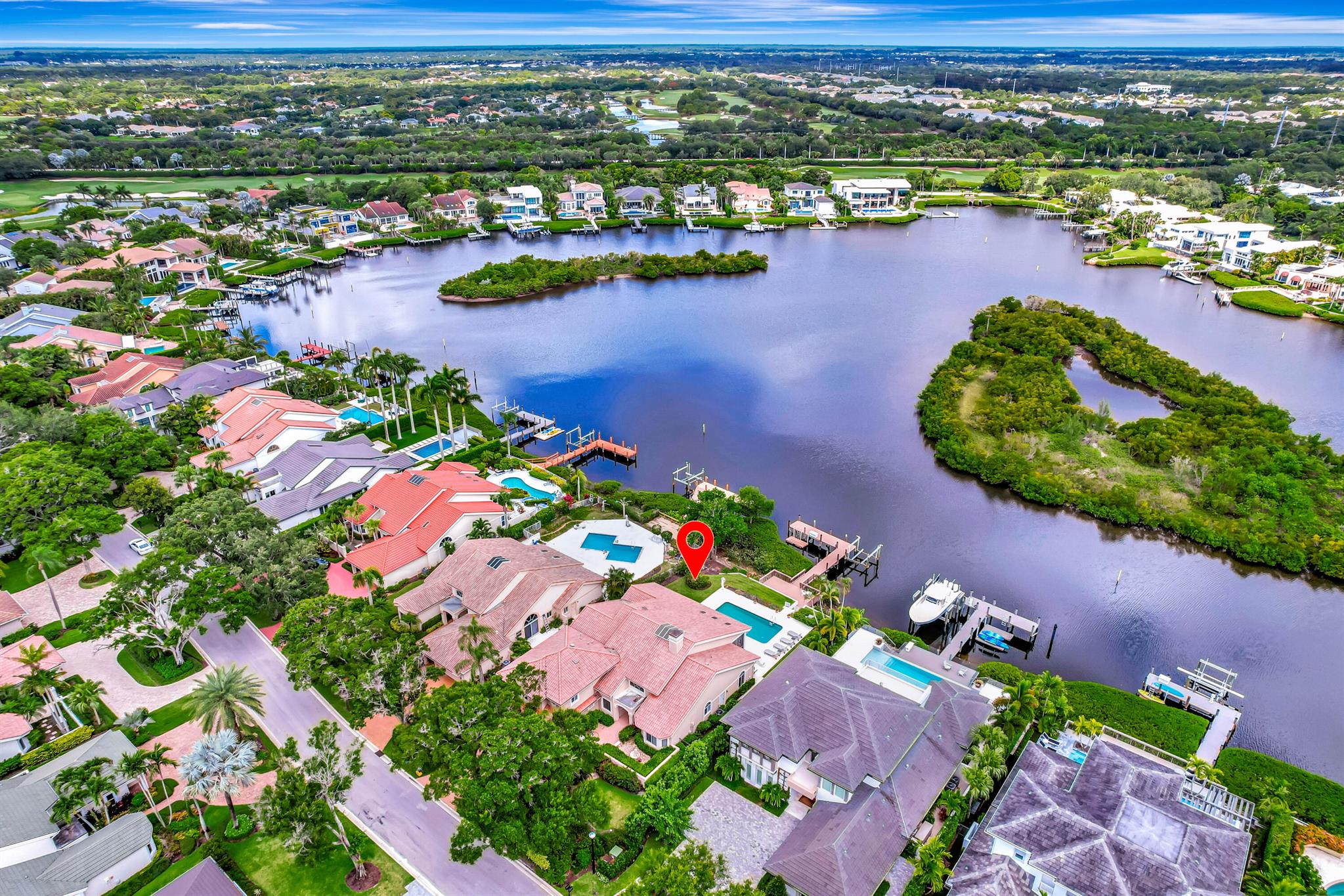 Build your dream home on one of the most exceptional waterfront lots in Admirals Cove! Enjoy sweeping long water views that offer both scenic beauty and rare outdoor privacy. Located on the coveted, tree-lined street of Victory Drive, just minutes from the front entrance and world-class club amenities, this property includes a private dock that can accommodate a boat up to 50 feet. A truly rare opportunity, as no waterfront lot has been available on this street in over four years. Required golf membership purchase conveys all the first class amenities of Admirals Cove including two spectacular clubhouses, 45 holes of golf, 5 restaurants, 58 slip marina with floating docks, Yacht Club, 9 har tru tennis courts, 12 pickleball courts, state of the art fitness and wellness center with... Technogym machines, 21,000 sq ft spa & salon, 30 room Waterside Private Boutique Hotel for members and their guests, new Golf Learning Center, Covesters kids club, dog park and Platinum service.
