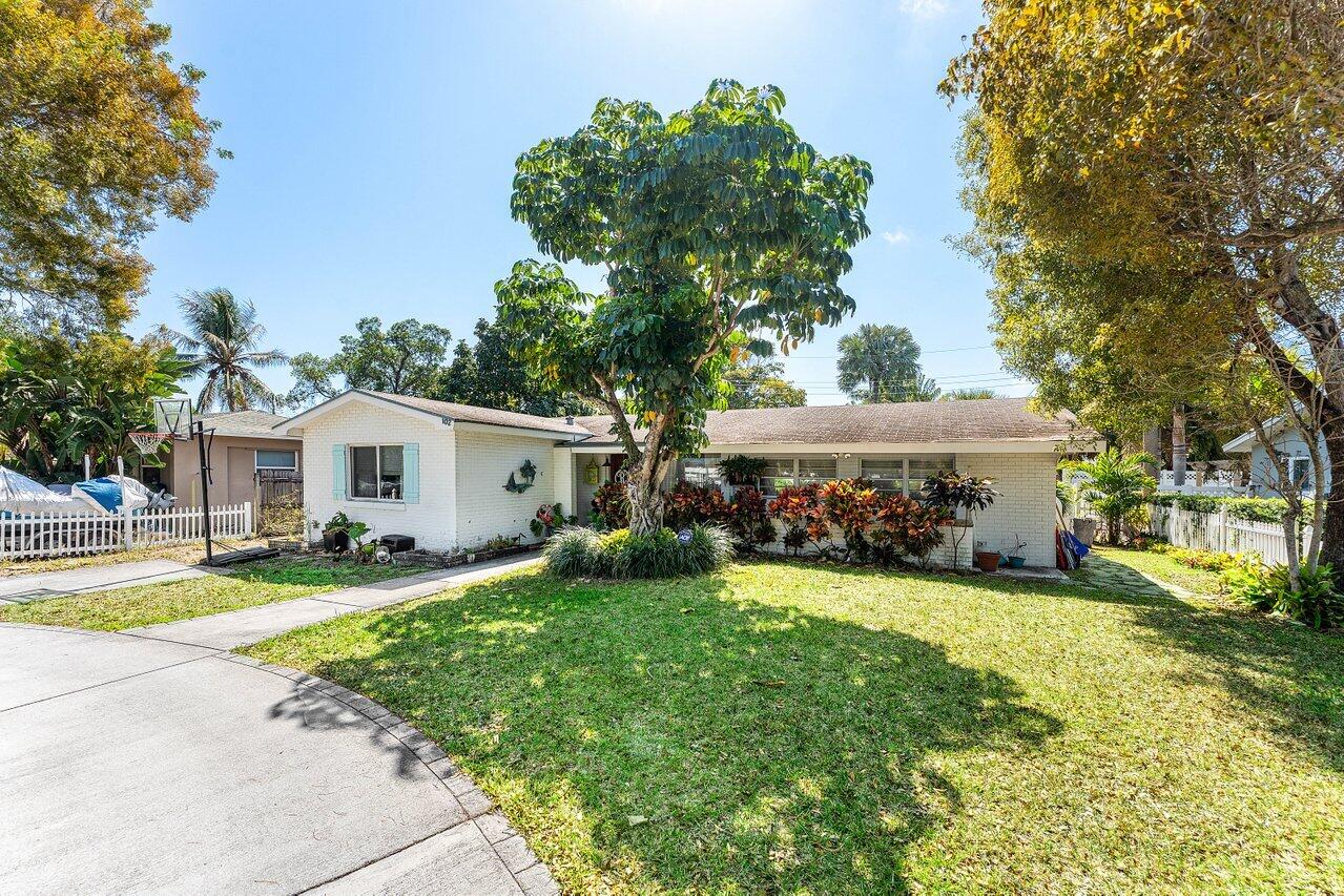 Live just minutes from the best of Delray Beach. Located in one of East Delray's rapidly evolving non-HOA neighborhoods, this 3-bedroom, 2-bath residence sits moments from Atlantic Avenue, Pineapple Grove, and the beach. Walk or bike to downtown dining, shopping, and nightlife while enjoying the privacy of a residential street.

The home offers a functional layout with generous living space and a sizable backyard with room to design your own outdoor retreat. Mature trees and established greenery give the property a true South Florida feel.

Surrounded by new development, this location continues to see strong growth. Whether you're looking for a primary residence close to the action or a smart move in one of Delray's most desirable pockets, this address delivers.