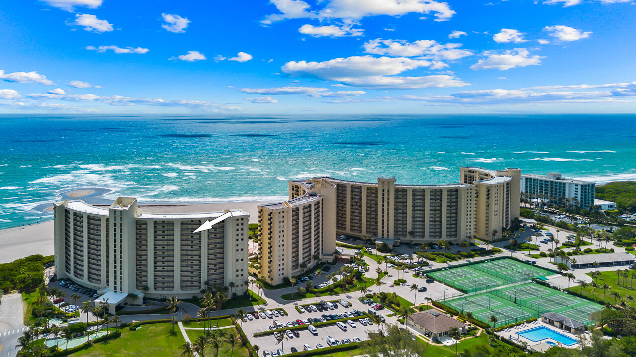 Discover an exceptional opportunity to own a piece of paradise in one of Jupiter's most sought-after beachfront locations. This 2-bedroom, 2-bath oceanfront condominium has been freshly painted in beautiful Dove White with the popcorn ceilings removed, creating a bright, airy, and modern feel throughout the home. The beautifully renovated primary bathroom adds a stylish, move-in-ready touch, while the kitchen and guest bath offer the perfect opportunity for light updating to make the space your own. Priced with improvements in mind, this condo presents incredible value for beachfront living. Wake up to breathtaking sunrises over the Atlantic Ocean and unwind in the evening with a glass of wine as the ocean breeze rolls in. From your private balcony, enjoy direct, unobstructed ocean views,  Situated in the vibrant heart of Jupiter, you're just moments from everything that makes the Inlet District so special dining, entertainment, boating, and more. Whether you're looking for a full-time residence, seasonal getaway, or investment opportunity, this property offers one of the best values on the beach. This is more than a home it's a lifestyle waiting to be customized to your taste. A must-see for anyone dreaming of beachfront living.