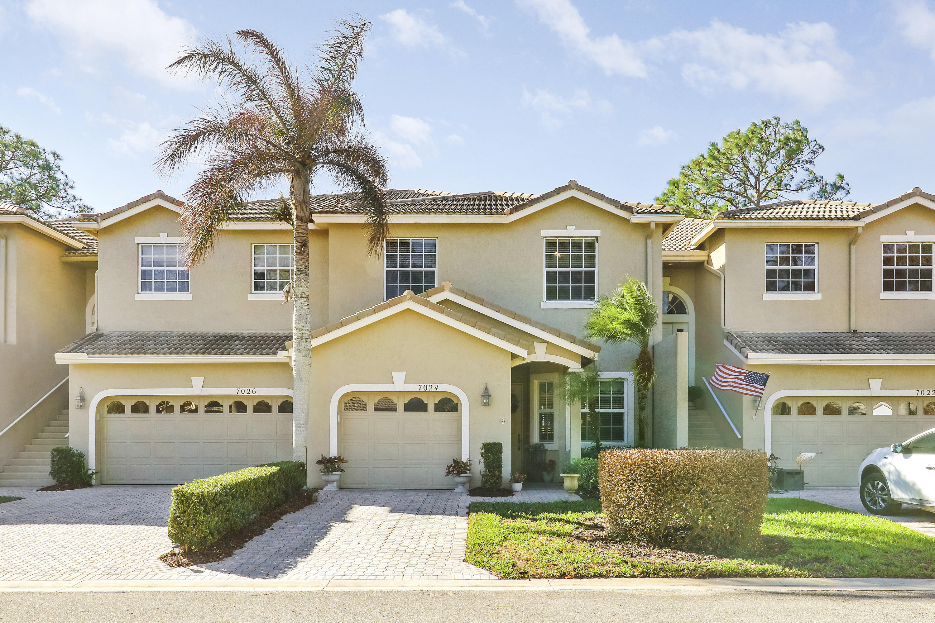 ENJOY GOLF VIEWS FROM THIS NICELY UPDATED TOWNHOUSE IN THE TORREY PINES NEIGHBORHOOD OF PGA VILLAGE! Move right into this 3BR/2.5BA/1CG home with the main bedroom suite located on the first level. Some of the many special features include an open floor plan with soaring ceilings, hard surface flooring throughout the first floor, neutral interior paint, updated master bathroom suite, some impact glass windows & doors and a cheery kitchen with white cabinetry, granite counters & stainless steel appliances. The ground level of this home is complete with the main bedroom suite, half bath, living area and kitchen, while upstairs you'll find two bedrooms and a bathroom, providing the perfect space for visitors. The screened and covered patio overlooks the golf course views. Located just steps away from the Torrey Pines neighborhood pool, the ideal spot to meet with neighbors, relax in the sun with a book or take a swim. HOA dues cover cable, internet, lawn care, mulching, tree & hedge trimming, common area maintenance, community security and access to the Island Club. PGA Village is an amenity rich community with COUNTY ONLY TAXES surrounded by multiple golf courses where MEMBERSHIP IS OPTIONAL. Activities at the Island Club include pickleball, tennis, resort style pool, exercise rooms, ballroom, billiards and more. A short drive to the Palm Beaches, Stuart, Jensen Beach, Vero Beach, airports, NY Mets spring training, dining, shopping and beaches. Call today to view!