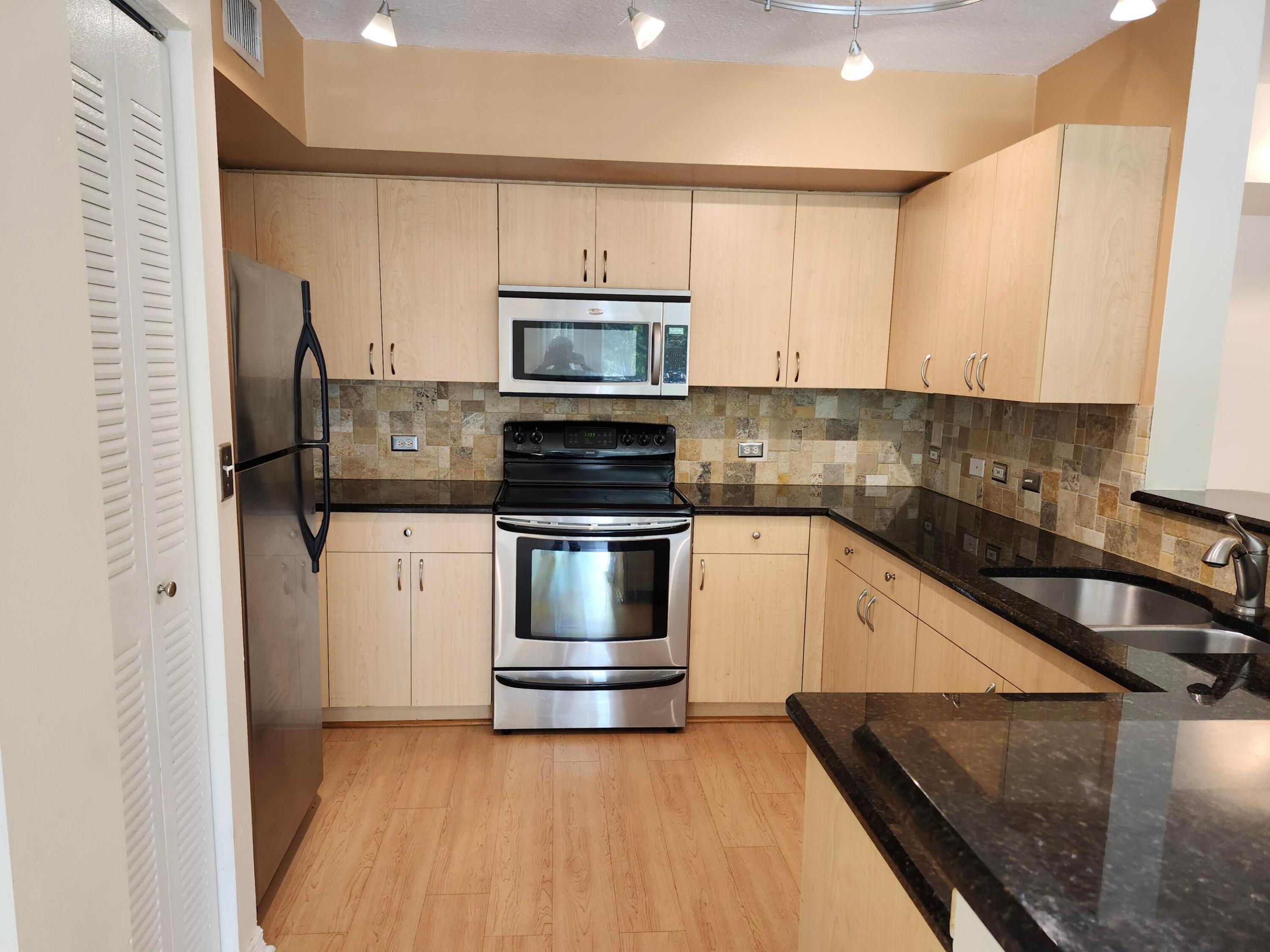 VERY NICE TWO BEDROOM CONDO IN RESORT STYLE COMMUNITY. VINYL PLANK FLOORS THROUGHOUT. NO CARPET.  GRANITE COUNTER TOPS AND STAINLESS STEEL APPLIANCES.FULL SIZE WASHER/DRYER AND IMPACT GLASS WINDOWS.CLOSE TO BEACH, I-95, AND ATLANTIC AVE IN DELRAY. GATED ENTRANCE, HEATED POOL, JACUZZI, GYM, BILLUARDS, INDOOR BASKETBALL/RACQUETBALL COURT AND BBQ AREA AT THE POOL. BASIC CABLE AND WATER INCLUDED IN THE RENT. TENANT MUST HAVE 675 CREDIT SCORE OR BETTER AND INCOME 3 TIMES THE MONTHLY RENT.