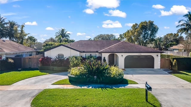 This energy efficient, fully remodeled corner 10,000 sqft lot home is an absolute must see in Cooper city! Offering 3 bedrooms, 2 baths, and a split floorplan featuring gorgeous wood flooring throughout. This spacious backyard offers a well-appointed summer kitchen including Pizza Chimney and a huge backyard and side-yard with a CBS hurricane proof storage shed with sound insulated interior walls. Additional features include a insulated hurricane proof garage door, hurricane impact windows, spray foam insulation on the roof deck, 2020 roof, indoor laundry room and pantry. Centrally located to all major highways and the Fort Lauderdale airport, and minutes walking from A+ rated school in Cooper City, this home will not last long!