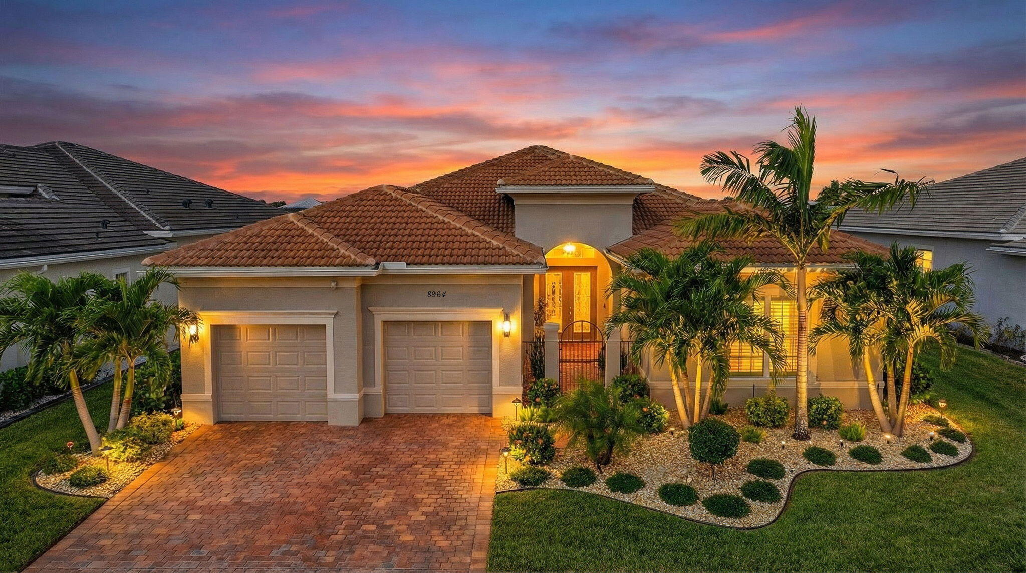 Welcome to an exceptional Collina model residence within Cresswind at PGA Verano, a premier 55+ community offering refined living and outstanding amenities. This home delivers 3,244 square feet of thoughtfully designed living space and was built with nearly every available builder upgrade, creating a level of quality, finish, and detail that would be difficult and time-consuming to replicate today.

The arrival is polished and inviting, framed by a decorative entry gate and lush, custom landscaping. Inside, diagonal-set tile flooring, crown molding throughout, tray ceilings, and architectural detailing create a clean, elegant atmosphere. The kitchen is a true showpiece, featuring quartz countertops, an oversized island, upgraded soft-close cabinetry, designer backsplash, built-in wall The kitchen is a true showpiece, featuring quartz countertops, an oversized island, upgraded soft-close cabinetry, designer backsplash, built-in wall oven, electric cooktop, glass canopy hood, and a full stainless appliance packageperfect for both entertaining and everyday living. The primary suite offers a spa-inspired retreat with upgraded quartz vanities, frameless glass shower, and floor-to-ceiling tile. Guest accommodations are equally well-appointed, including a cabana bath with direct indoor-outdoor access. Outdoor living is exceptional, highlighted by an expanded, screened-in lanai offering rare privacy and a tranquil, zen-like setting surrounded by mature landscaping. Impact windows and doors, upgraded laundry room, enhanced lighting, full gutter system, and meticulous craftsmanship complete the offering. Residents enjoy access to the Club Talavera resort-style pools, fitness and wellness facilities, tennis, pickleball, and a vibrant calendar of social and dining events. Best of all, this highly upgraded home is immediately availableoffering the opportunity to enjoy luxury living now, without the extended wait of new construction.

A rare, offering in Cresswind at PGA Verano.