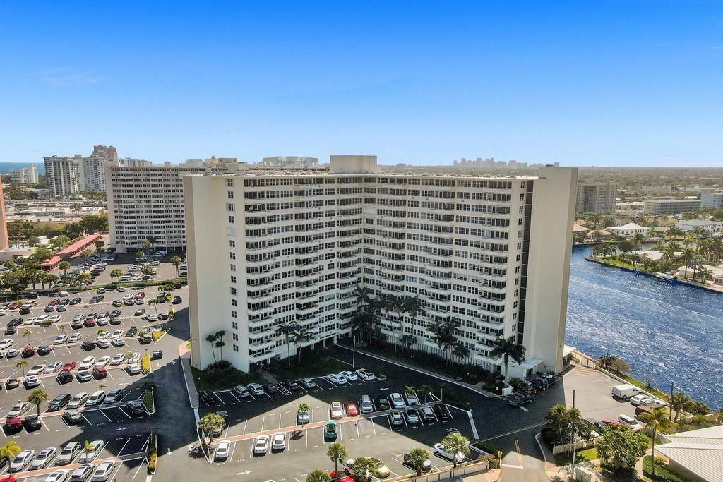 Location, location, location! Come see this home in the sky with stunning 180 views! Rarely available high floor unit in Coral Ridge Towers North with direct intracoastal views! The moment you enter this unit you'll be captivated by the forever water views from the living area and bedroom. This unit awaits your personal touches but features new impact windows and doors & a large floor plan with lots of natural light. This highly-desirable building boasts a resort-style pool area on the intracoastal, fitness center, community room, 24/7 security and on-site management. Only blocks to the beach, shopping, restaurants, entertainment and water taxi! The association states one buyer must be at least 55 years old, no rentals and no pets.