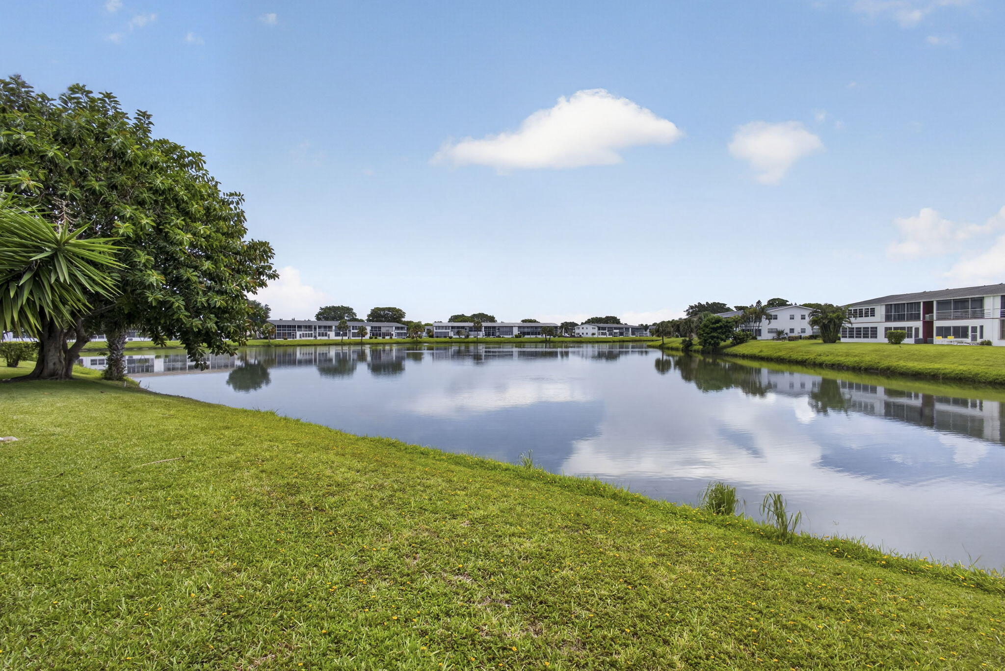 DON'T MISS OUT ON THIS BEAUTIFULLY MAINTAINED 1BEDROOM 1.5 BATH GROUND FLOOR CONDO IN CENTURY VILLAGE WEST PALM BEACH, A GATED COMMUNITY FOR ACTIVE ADULTS 55+.  THIS LIGHT NEUTRAL- COLORED HOME FEATURES CERAMIC TILE THROUGHOUT, OPEN CONCEPT KITCHEN IS UPDATED WITH A DOUBLE SINK UPDATED BATHROOMS , HURRICANE IMPACT WINDOWS AND A MAGNIFICENT LAKE VIEW.  SHORT WALK TO THE KENT POOL. WELL RUN ASSOCIATION. 4 YEAR OLD ROOF AND NO ASSESSMENTS.  RENTABLE IMMEDIATELY FOR 6 MONTHS A YEAR. COME & ENJOY RESORT STYLE LIVING IN THIS GATED COMMUNITY FOR ACTIVE ADULTS 55 +. CLUBHOUSE features a theater, indoor pool, card room, community/party room, billiard room shuffle board ,tennis , pickleball ,bocce and two outdoor pools .Numerous heated pools throughout the community. Separate fitness center, with sw a gym, swimming pool, resistance pool and fitness classes.  Two guarded gates and 24 hour roving security patrol. GREAT LOCATION: close to shops, restaurants, PBI airport and beaches