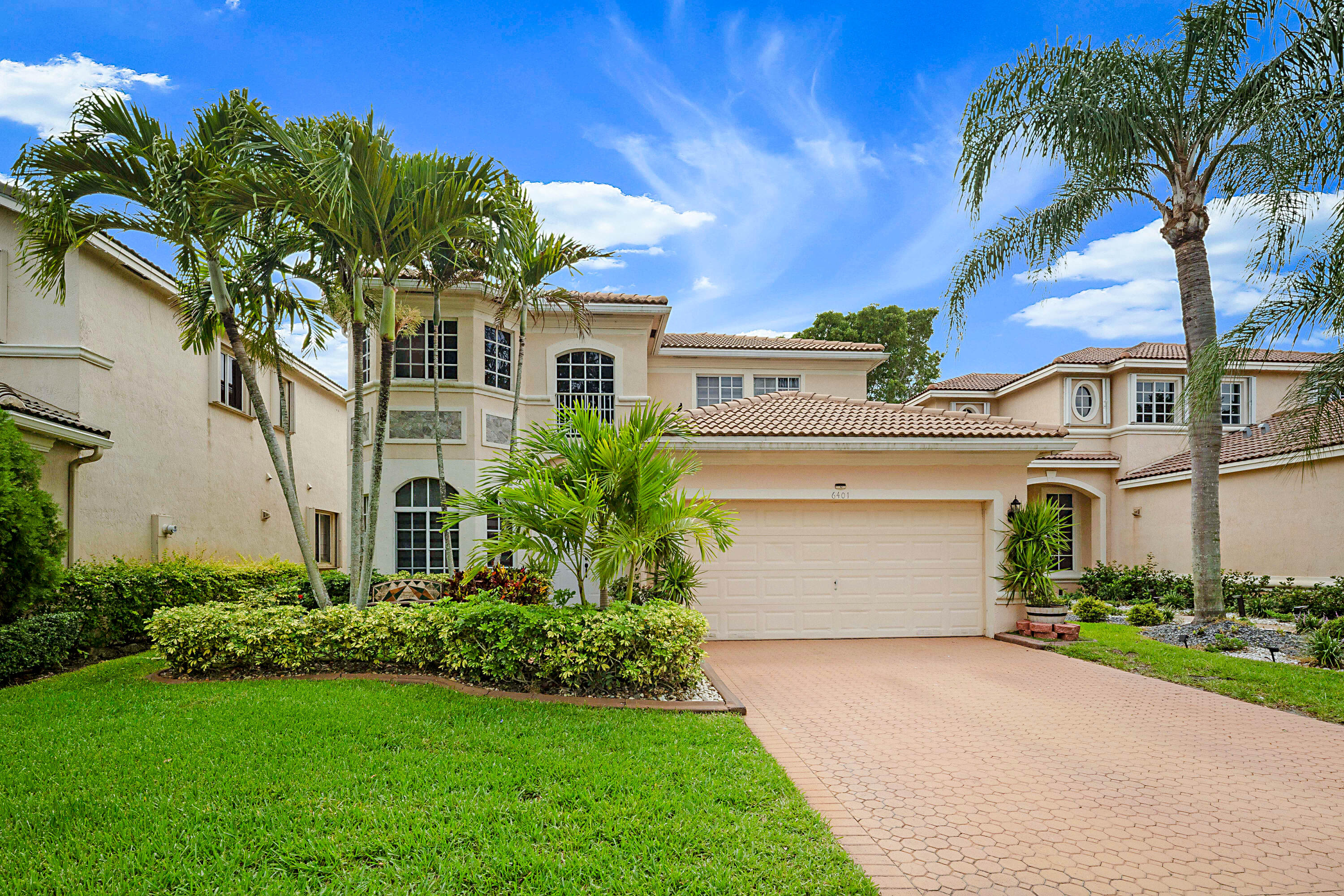 Welcome to this spacious Four-bedroom, two-and-a-half-bath, residence in Laguna Isles, The home features a bright and open floor plan with spacious living and dining areas, abundant natural light, tile flooring throughout the main living spaces, and a generous primary suite. The kitchen opens seamlessly to the family room, creating the perfect setting for everyday living and gatherings. Step outside to a private backyard with plenty of room for outdoor entertaining, relaxation, or future customization. Additional highlights include a two-car garage, hurricane protection, and a desirable location within one of the area's most sought-after communities. Residents of Laguna Isles enjoy resort-style amenities including a clubhouse, swimming pool, fitness center, and tennis courts,