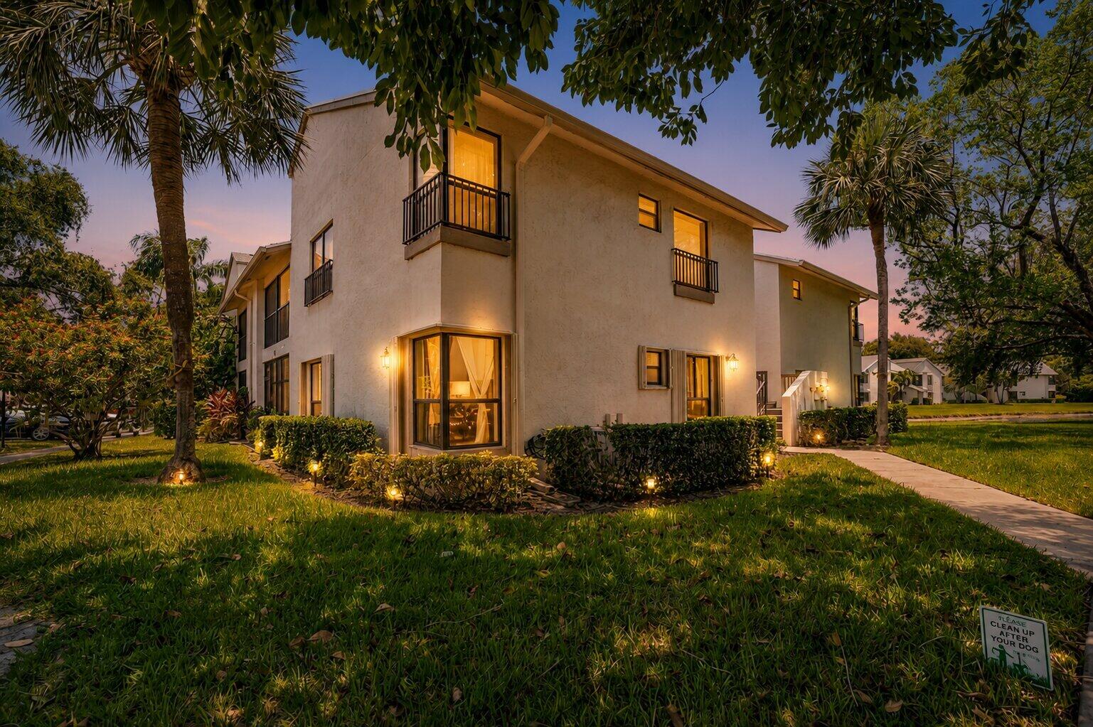Welcome Home! This beautifully remodeled first-floor corner condo offers the comfort and feel of a house with the convenience of condominium living. Some of the rooms were virtually staged for the privacy of the seller. The updated kitchen is a dream for cooking and baking enthusiasts, featuring double wall ovens, stainless steel appliances, granite countertops, and abundant cabinet space. The spacious floor plan includes 3 bedrooms, beautifully remodeled bathrooms with walk-in showers, and tile flooring throughout for easy maintenance.  Enjoy the versatility of the enclosed patio, perfect for a home office, den, reading room, or additional living space. With generous room sizes and a bright corner location, this home is designed for comfortable living  Property has Accordeon shutters on all windows. New Roof installed. The community offers outstanding amenities, including an Olympic-size swimming pool, fitness center, clubhouse, and beautifully maintained grounds. Conveniently located near shopping, dining, parks, and major roadways, this move-in-ready condo is the perfect place to relax and enjoy the Florida lifestyle.
