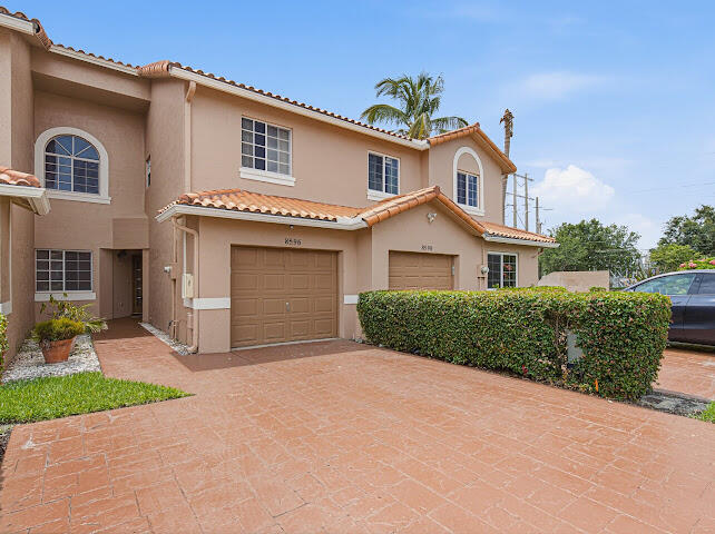 Rarely available in this community, this spacious three-bedroom, two-and-a-half-bathroom home with a one-car garage offers comfort, convenience, and standout features throughout. The eat-in kitchen includes new Samsung stainless steel appliances, a large pantry, and plenty of functional space. The main living areas feature tile flooring, while each bedroom includes built-in closet systems for added storage. Enjoy a private back porch, access to the community pool, and a layout that makes this home an exceptional find within the complex.
