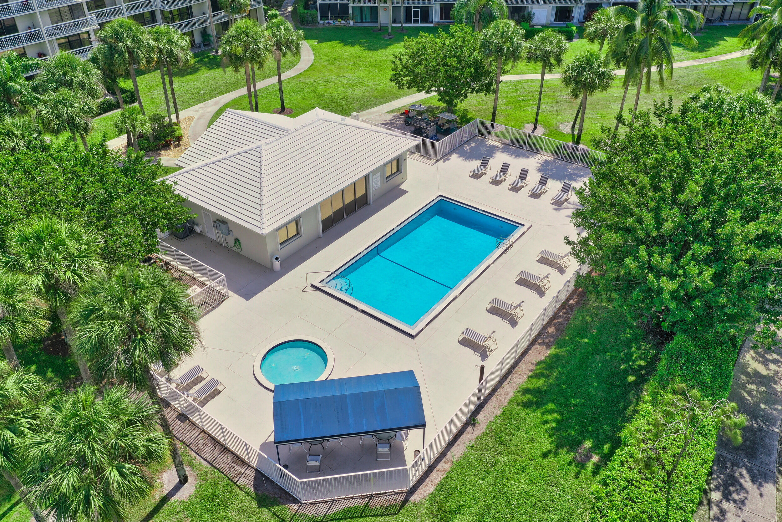 Welcome to this well-appointed condominium located in Whitehall Villages, offering 1,385 square feet of finished living space. This 3rd floor condo features 2 bedrooms and 2 full bathrooms, along with spacious laundry room - can be used as bonus room or office. Light and bright throughout, this lovely unit offers spacious kitchen, split floor plan, hurricane shutters and 2 balconies with sweeping pool and garden views.