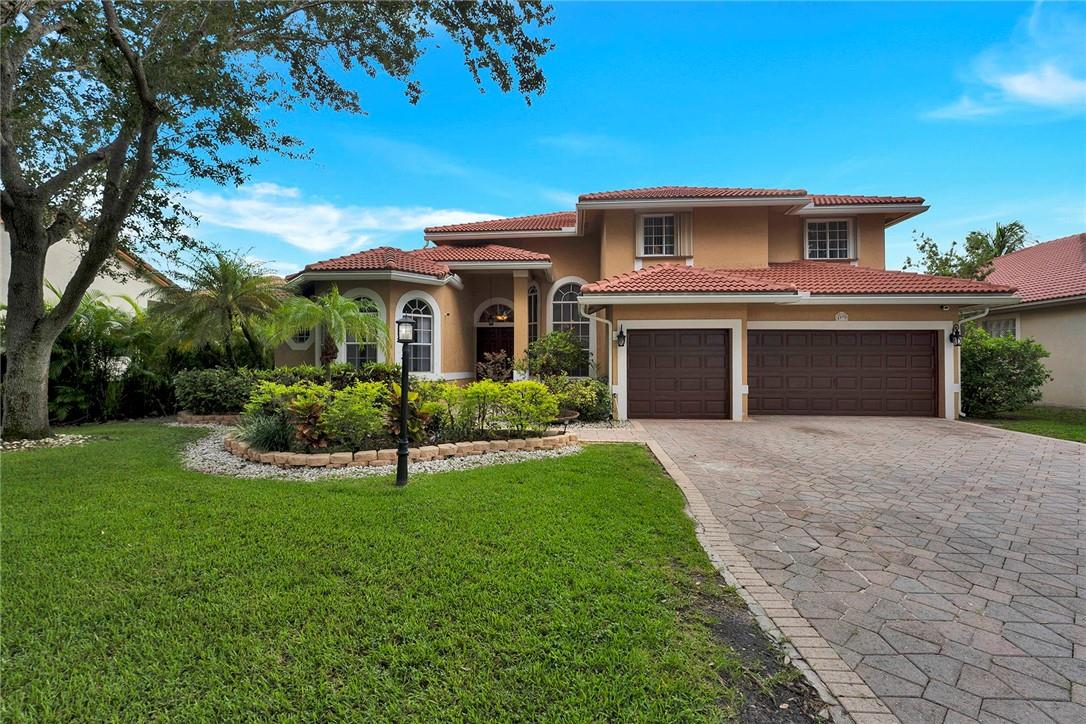 THIS HOME OFFERS A BEAUTIFUL LAKE VIEW OF THE SUNSET . LOTS OF FRUIT TREES, GRANITE COUNTERTOPS. THIS STUNNING FIVE BEDROOMS,THREE AND ONE HALF BATHS, THREE CAR GARAGE HOME AWAITS YOUR LUXURIOUS APPETITE. SPACIOUS MASTER SUITE ,WITH A CALIFORNIA WALK IN CLOSET, ANOTHER BEDROOM SUITE IS LOCATED ON THE GROUND FLOOR. THE MASTER BATH FEATURES A JACUZZI AND A LARGE SHOWER. NEW ROOF INSTALLED IN 2021, ACCORDIAN SHUTTERS, 24 HOURS MANNED SECURITY, VERY LOW MONTHLY MAINTENANCE. SELLER WILL CREDIT BUYER $30K AT CLOSING TOWARDS UPGRADES.