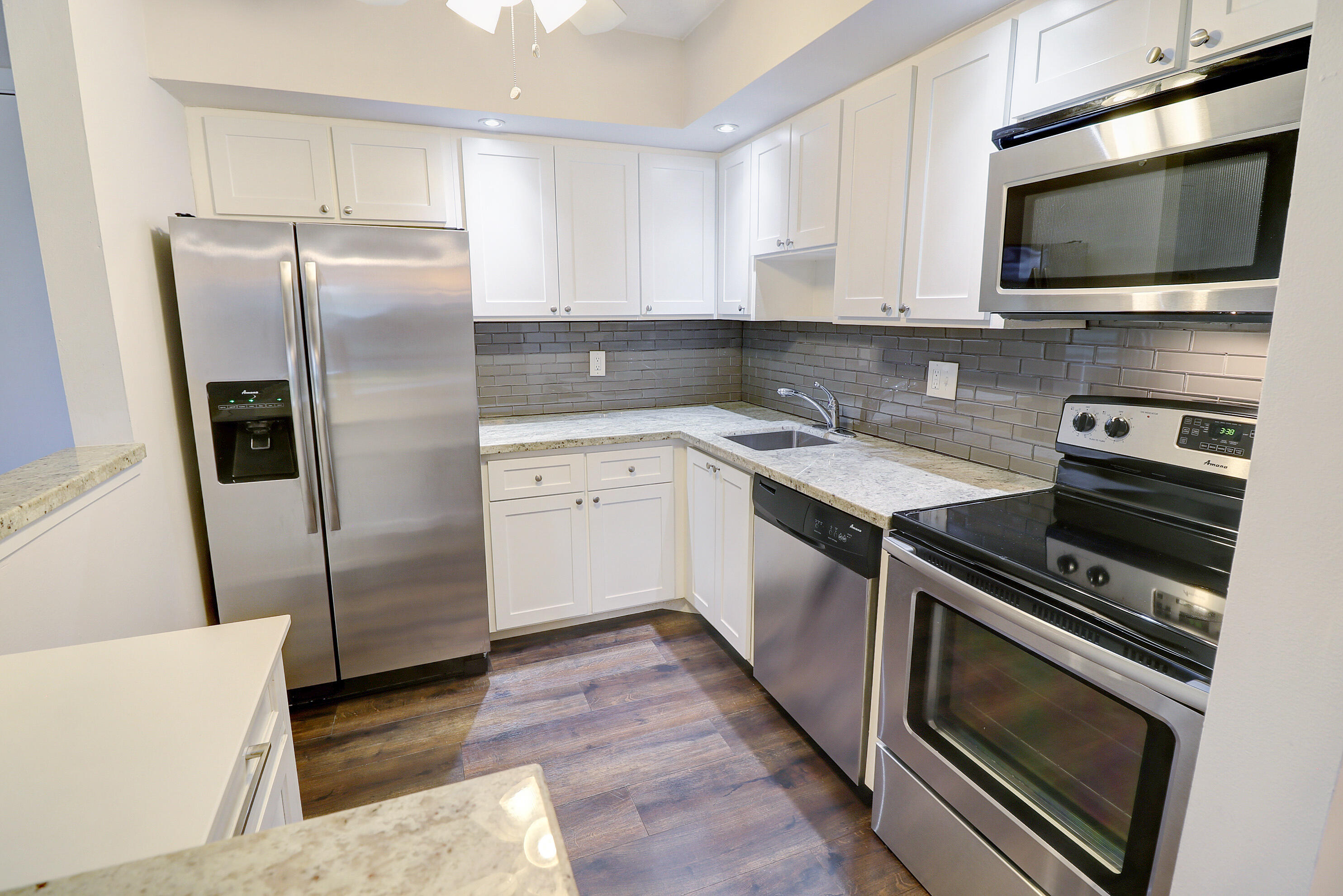 Beautifully maintained 2-bedroom, 1-bath first-floor condo in the desirable 55+ gated community of Kings Point in Tamarac. The unit offers bright living spaces, in-unit washer and dryer, and easy ground-floor access.  Residents enjoy resort-style amenities including pools, fitness center, tennis courts, clubhouse, theater, social clubs, and a wide range of activities and events. Conveniently located near shopping, dining, medical facilities, and major highways, it offers an ideal South Florida active adult lifestyle.