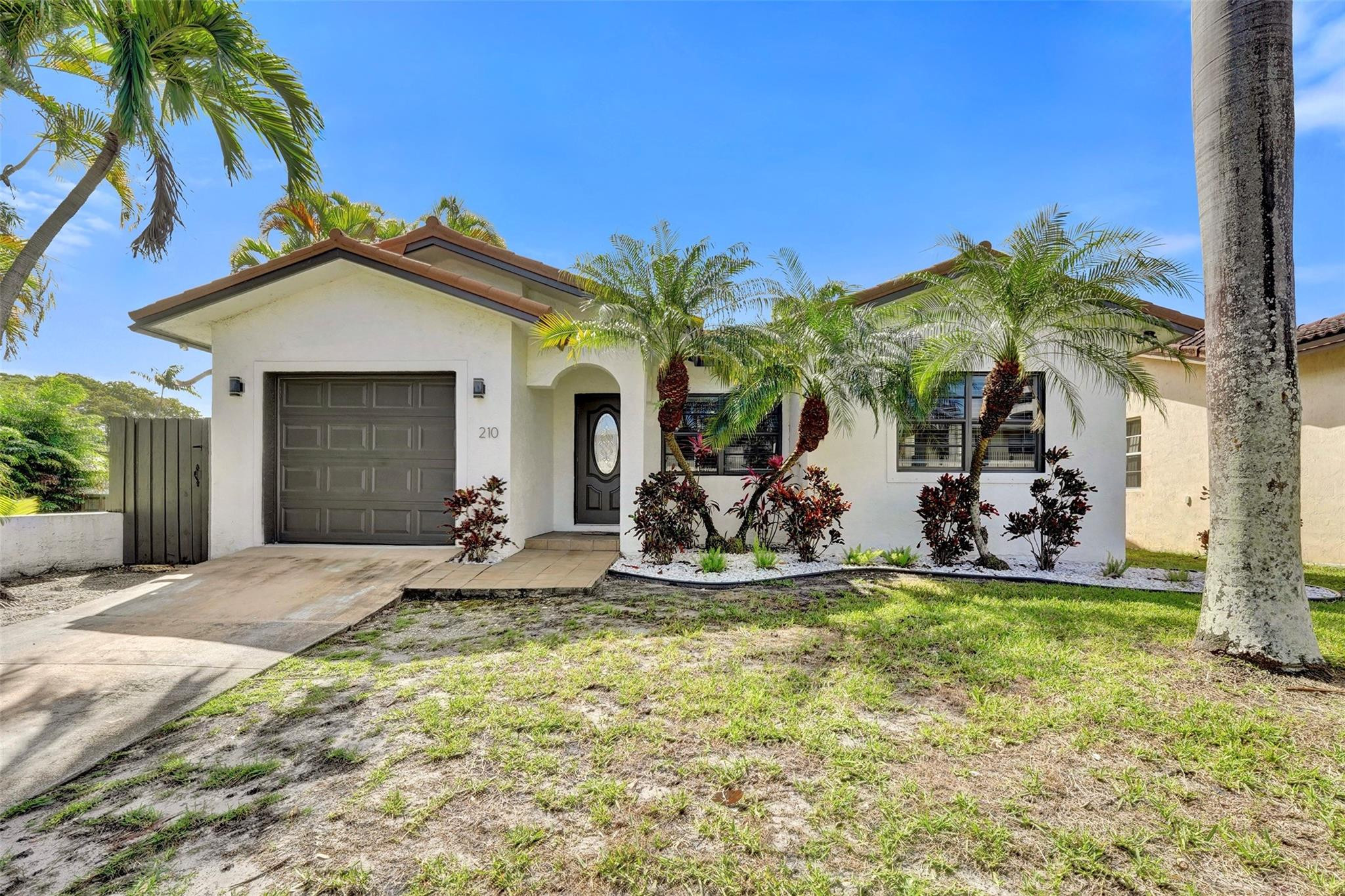 This house is fabulous! With 3 bedrooms, 2 baths, and a 1 car garage, you are going to love the beautifully renovated interior with a bright and open floor plan. The stunning kitchen and bathrooms, waterproof vinyl flooring, and 2022 metal roof add both style and long term value! Enjoy the Florida sunshine with a private hot tub and fun mini golf setup in the backyard. Perfectly located in the heart of East Dania Beach, you are close to Jaxson’s, My Mama’s Cafe, Dania Casino, Dania Pointe, as well as plenty of other restaurants and grocery shopping. Not to mention being only 2 miles to both the beach and FLL airport! This property is perfect for a primary residence, second home, or an investor seeking short or long term rental opportunities.