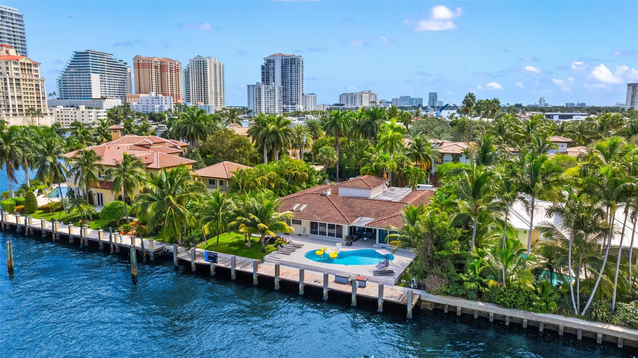 Direct Intracoastal waterfront opportunity in one of Fort Lauderdale's most sought-after luxury enclaves. Offering true deep-water frontage with no fixed bridges and direct ocean access, this exceptional property showcases expansive Intracoastal views, excellent dockage, and a brand-new wood dock. Ideally positioned just moments from world-class beaches, premier marinas, five-star resorts, Las Olas Boulevard, and both executive and international airports. The existing residence can be enjoyed as-is, renovated, expanded, or reimagined into a custom waterfront estate, offering exceptional flexibility and long-term value. A rare offering for investors, developers, or end-users seeking to create a bespoke waterfront estate in a premier AAA location.