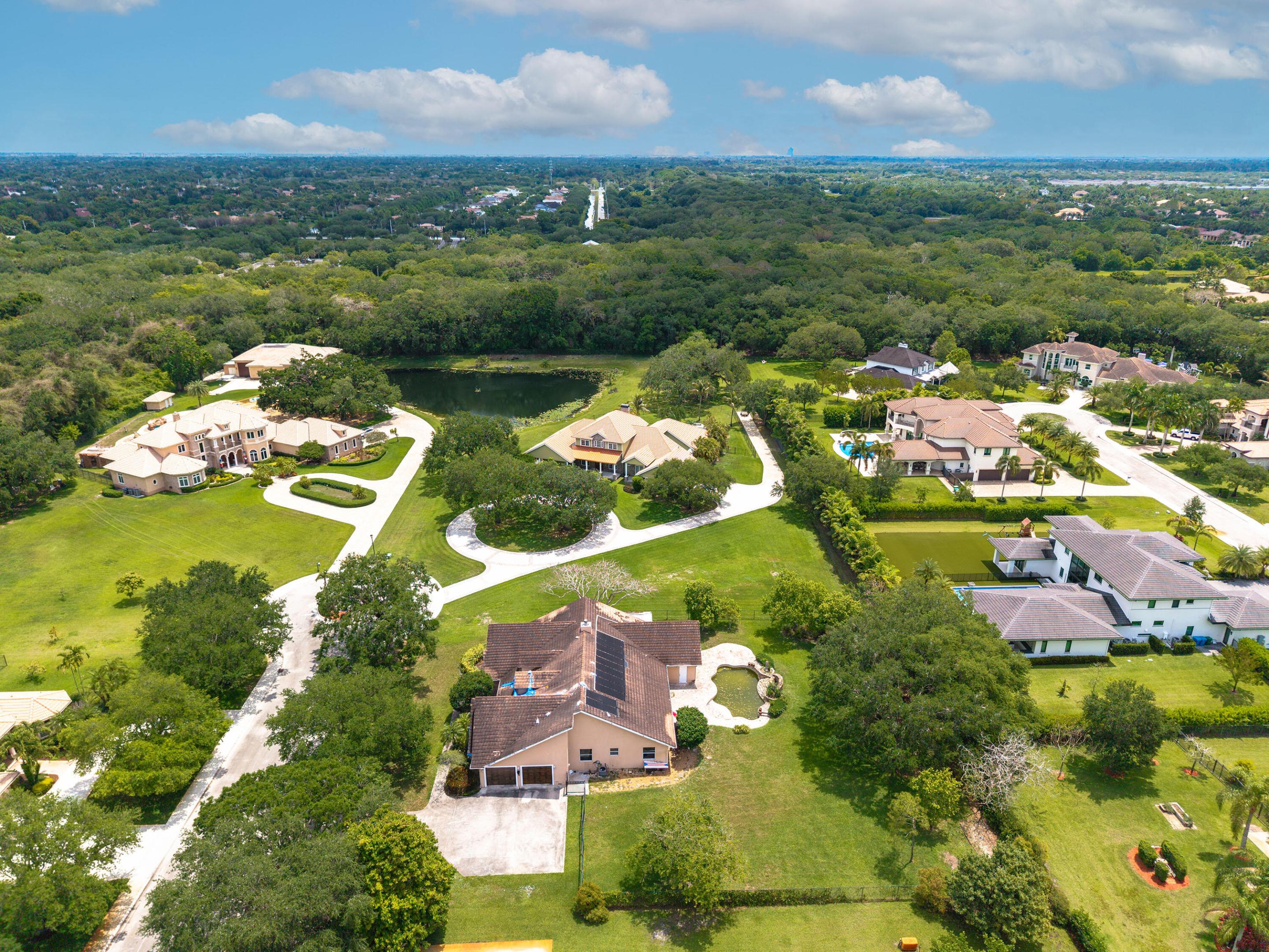 Exceptional redevelopment opportunity in the gated community of Hicks Estates in Davie. Situated on approximately 0.81 acres (35,197 SF), this existing estate residence offers 4000 SF under air. The property also features an in-ground pool, an attached garage, and an expansive homesite surrounded by luxury estates. Located within a gated community and backing to a preserve setting, this property offers substantial upside potential and the ability to create a custom estate in one of Davie's sought-after areas. Property is being sold in its current condition.