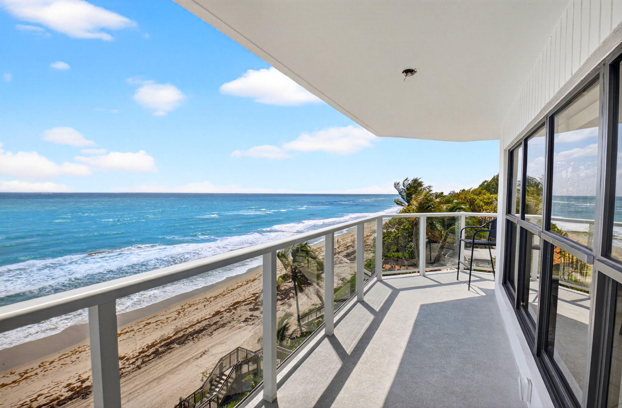 Experience oceanfront living in this exceptional residence at Parker Highland, one the most coveted boutique buildings in Highland Beach. Residence 5A at 4605 S Ocean Blvd is an east-facing corner unit offering direct, unobstructed ocean views from the moment you enter, creating a breathtaking backdrop for everyday living. This spacious 3-bed, 3-bath condo spans 2,600 living sq ft, perfectly balancing comfort and coastal sophistication. The open layout provides a gracious sense of space, while expansive windows bring the sights and sounds of the ocean indoors ideal for relaxed coastal living. An expansive balcony with modern glass railings wraps the residence, connecting the interior to the surrounding water and sky. Included are 2 assigned garage parking spots.  Parker Highland offers privacy, exclusivity, and a premier Highland Beach location, just minutes from Boca Raton and Delray Beach dining, shopping, and cultural attractions. This is a rare opportunity to own a luxurious beachfront retreat where the ocean is always front and center. Parker Highland is pet friendly allowing 2 pets up to 20 lbs. Also, the building is a reinforced concrete building.