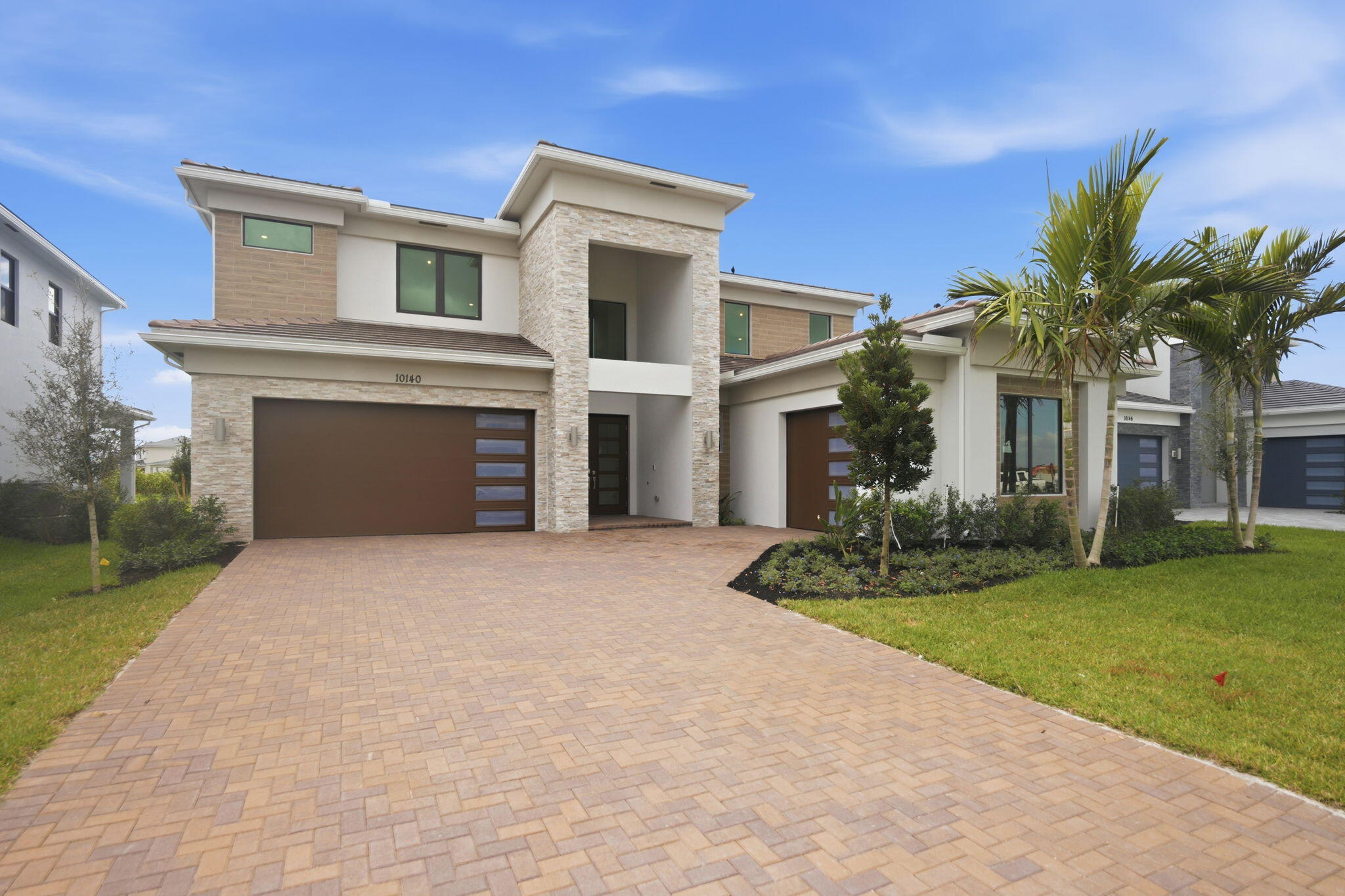 The largest plan in this collection is a sophisticated two-story home with tons of space .Off the double-height foyer is a secluded flex space . Down the hallway is a free-flowing layout shared among the kitchen, dining room and a sprawling Great Room with a lanai. On the same level is a lavish owner's suite with a spa-style bathroom. Upstairs are the remaining four bedrooms, each with a private en-suite bathroom, along with a spacious media room and loft.  Prices, dimensions and features may vary and are subject to change. Photos are for illustrative purposes only.