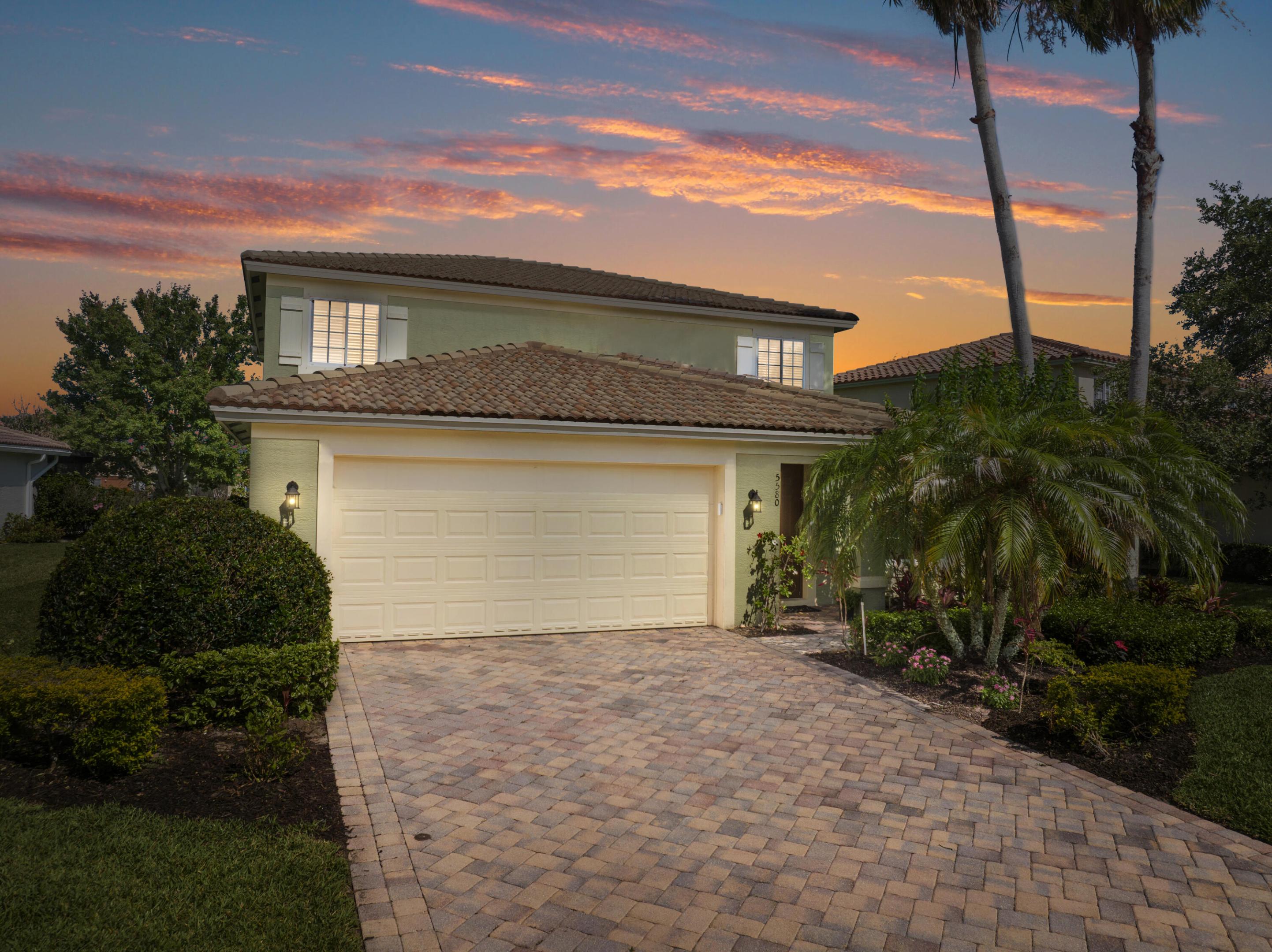 Nestled within the sought-after gated community of VeroLago, this spacious lakefront residence offers the perfect blend of comfort, convenience, and Florida lifestyle living in the heart of Vero Beach. Boasting a versatile layout with the primary suite conveniently located on the first floor, this beautifully maintained home features diagonal tile flooring, granite countertops, tile backsplash, multiple living spaces including both a formal living room and family room, plus an expansive upstairs loft accompanied by four additional guest bedrooms.  The oversized primary suite serves as a relaxing retreat with double vanities, a deep soaking tub, walk-in shower, and brand-new carpet. Thoughtful upgrades include new energy-efficient downstairs lighting with dimmers throughout most living areas, a newer refrigerator, and a February 2022 hot water heater. A convenient downstairs half bath makes entertaining guests effortless.  Step outside and enjoy peaceful lakefront views while being just minutes from everyday conveniences and some of the Treasure Coast's most desirable destinations. Located approximately 4 minutes from Publix, 8 minutes from Cleveland Clinic Indian River Hospital, and only about 12 minutes from Vero's pristine Atlantic beaches, this location provides quick access to shopping, dining, healthcare, and coastal recreation.  Residents of VeroLago enjoy resort-style amenities including a community pool, fitness center, tennis courts, and pickleball. The home is also offered fully furnished and decorated, negotiable for buyers seeking a seamless move-in-ready Florida retreat, seasonal residence, or investment opportunity.