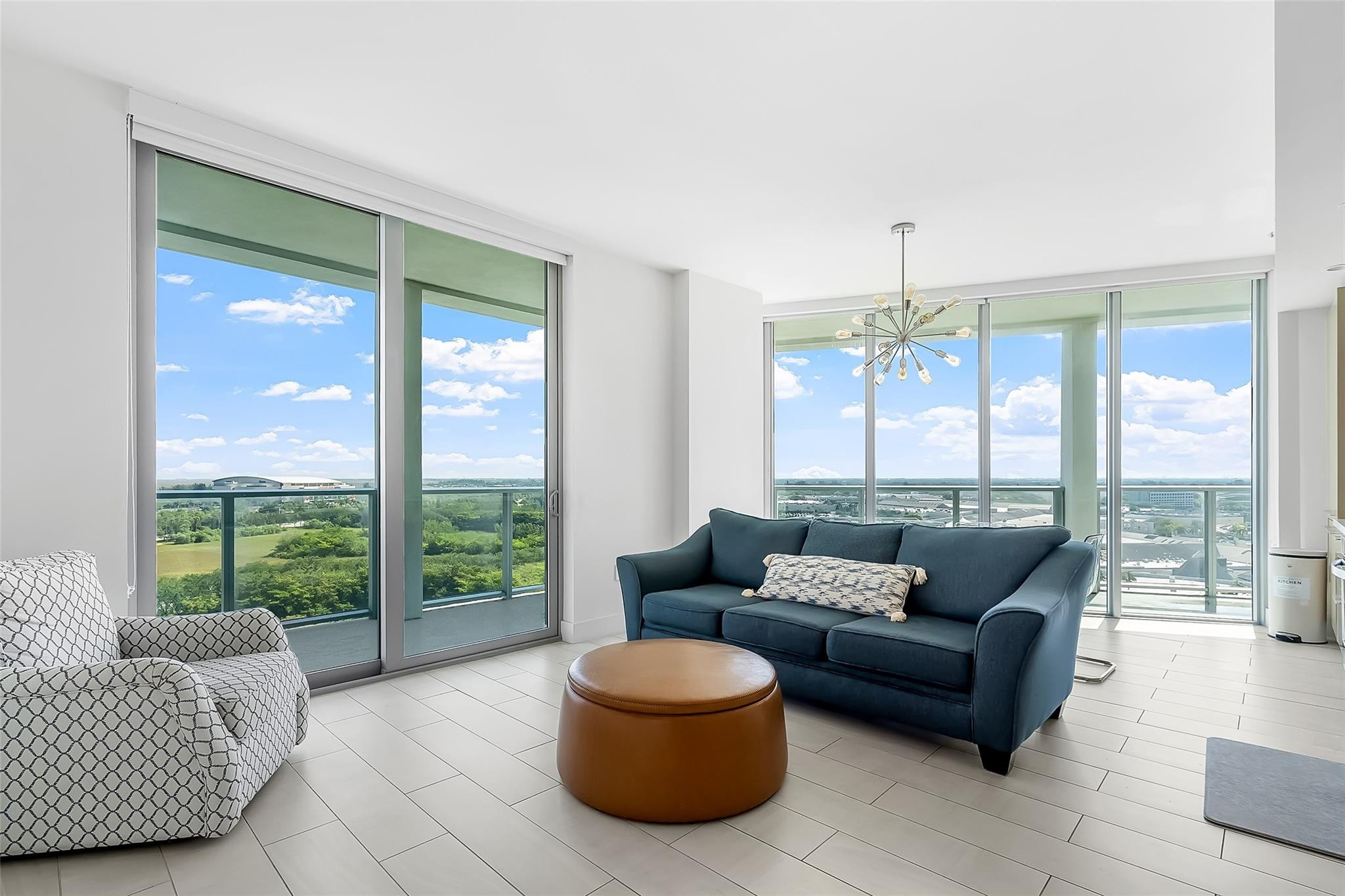 Wake up to breathtaking sunrises from your private wraparound balcony, a rare feature exclusive to the coveted corner residences at Metropica. Offering over 300 additional square feet of outdoor living space, this stunning 2-bedroom, 2-bathroom furnished residence showcases floor-to-ceiling impact windows that flood the home with natural light and capture spectacular city views. The modern kitchen features Italian cabinetry, quartz countertops, and premium stainless-steel appliances. The spacious primary suite includes a large walk-in closet and a luxurious spa-inspired bathroom. Enjoy world-class amenities including resort-style pools, fitness facilities, social spaces, 24-hour security, and concierge services. Ideally located just minutes from Sawgrass Mills, Amerant Bank Arena, dining,  use gps