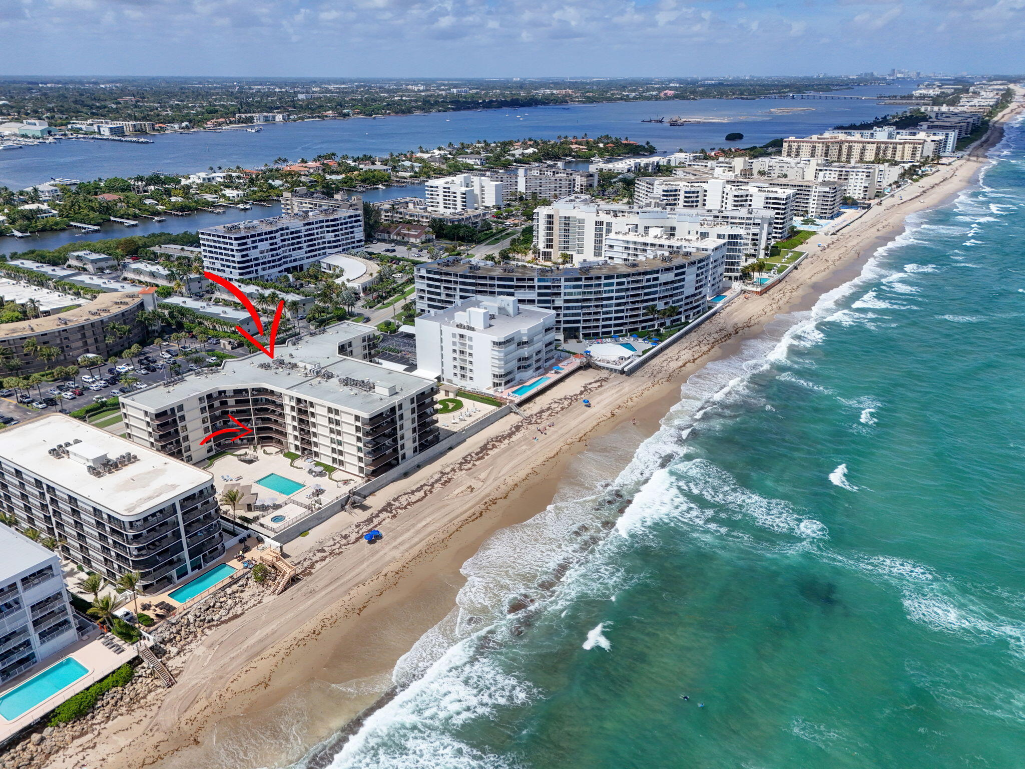 Live the beachfront lifestyle you've always dreamed of in this 2 bedroom, 2 bath condo overlooking the Atlantic Ocean.  The highly desirable Dune Deck condominium has undergone a stunning multi-year renovation. The new owners get the benefit of all assessments having been paid, work completed, and living in a building that has fully funded reserves.  Dune Deck is an extraordinary oceanfront building offering unmatched value in South Palm Beach.  This well-cared for, and gently used, seasonal condo is ready for its new owner and is being sold turnkey for the buyer's convenience.  Just move in and enjoy this oceanfront unit with its exceptionally large balcony overlooking the ocean and pool deck.  There is access to the oversized balcony from both bedrooms and the living room. Neutral tile  floors laid on the diagonal are throughout the living areas.  The unit has been tastefully updated and includes a primary bedroom with ocean views, en suite bath, and large walk-in closet.  Washer/dryer in unit.  Complete hurricane protection provides peace of mind.  The building offers resort-style amenities, including private beach access, heated pool, jacuzzi spa, kitchen cabana on the pool deck, a fully equipped fitness center, dedicated storage facility, a 24-hour doorman, social room, guest parking, and a covered garage for residents.  It is located within walking distance of a variety of dining options, retail therapy shops, the prestigious Eau of Palm Beach, and Publix.  Just minutes away from Palm Beach International Airport, Brightline, Worth Avenue, the Palm Beach Par 3 Golf Course and downtown West Palm Beach.