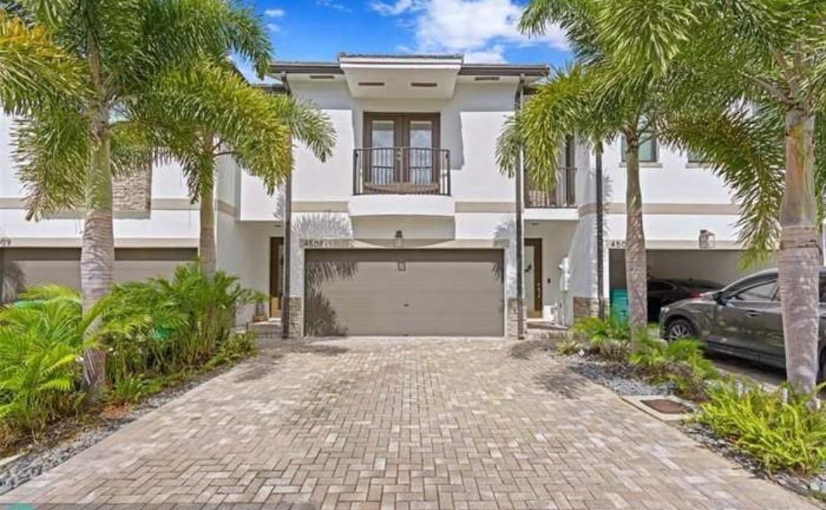 Welcome to luxurious South Florida living. This spacious 3 bedroom, 2.5 bath townhome was built in 2020 to the highest standards of comfort. The oversized master bedroom features a sitting area and private balcony. The spa like en suite bath features dual shower heads and sinks. The main floor showcases a desirable open floor plan with modern appliances and a built in electric fireplace. Grill your favorite meal on your private, sunset facing patio. Nestled in the sought after Aqua Bella dockside community, this gorgeous unit is conveniently located to Fort Lauderdale, Dania Beach, major highways, FLL Airport, Hard Rock Casino, and Dania Pointe Shopping Center.AVAILABLE FOR IMMEDIATE OCCUPANCY!! HOA REQUIRES A $1,000.00 TENANT SECURITY DEPOSIT.