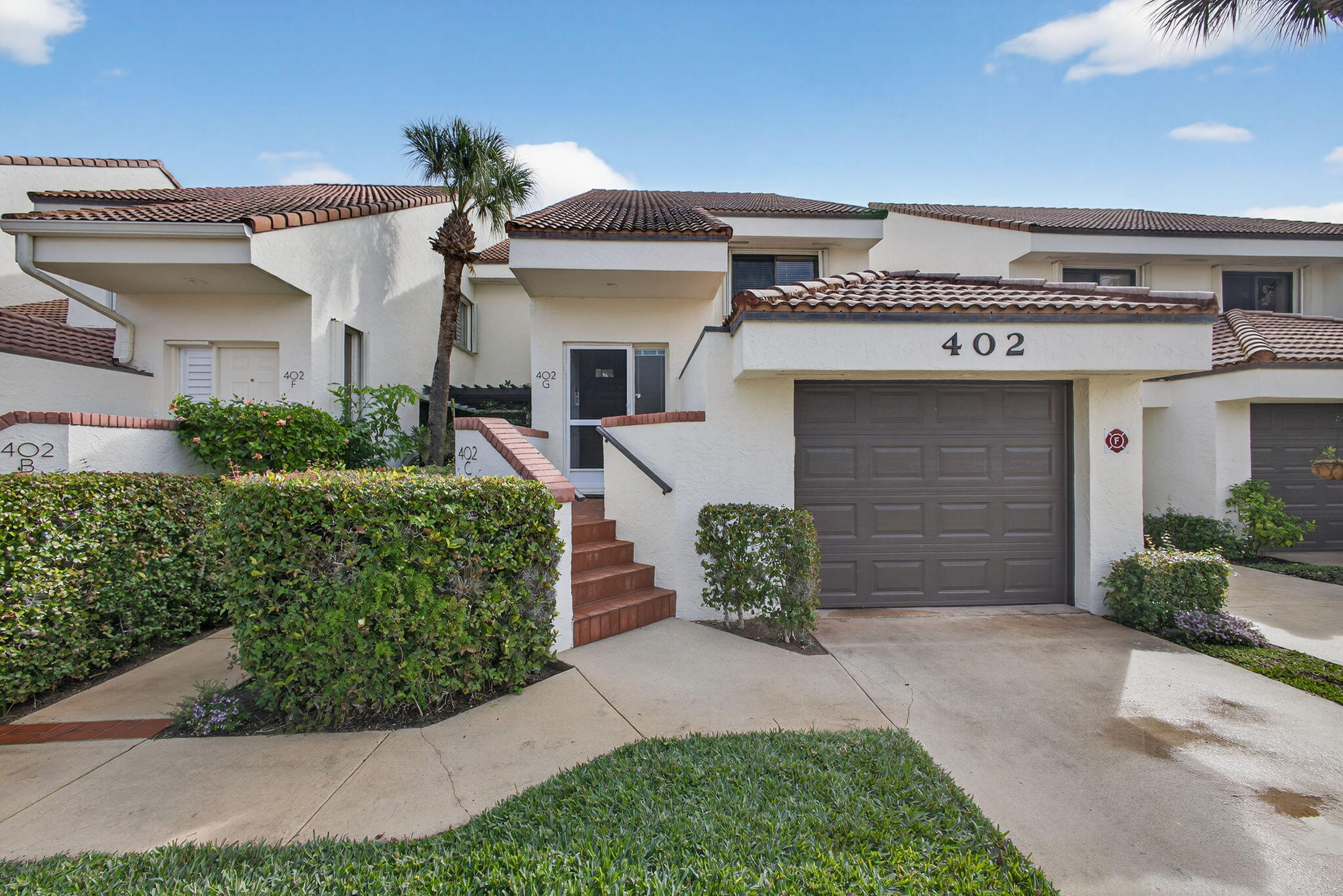 Beautiful 2-bedroom, 2-bath condo located in the highly desirable Sea Oats of Juno Beach community. This residence offers a comfortable floor plan with spacious living and dining areas, featuring vaulted ceilings and beautiful wood flooring throughout the main living areas. The updated kitchen is equipped with premium wood cabinetry, granite countertops, and stainless steel appliances. An enclosed patio overlooks the community pond, providing a peaceful and private setting to relax and enjoy the tranquil surroundings. The condo benefits from a premium interior orientation within the community, offering added privacy and separation from through traffic. Sea Oats is a well-established community known for its lush landscaping and resort-style amenities, including a community pool, tennis and pickleball courts, clubhouse, and walking paths. Located just minutes from Juno Beach, widely regarded as one of South Florida's most beautiful beaches, featuring soft white sand and striking Bahamian-blue waters. The area is also home to a nearby designated dog-friendly beach, offering a unique coastal amenity for pet owners. The surrounding area provides an exceptional coastal lifestyle with close proximity to renowned dining, waterfront restaurants, marinas, and shopping, including The Gardens Mall and the vibrant PGA Boulevard corridor, along with nearby golf courses, nature preserves, and convenient access to major roadways.  Whether used as a full-time residence or seasonal retreat, this condo offers an excellent opportunity to enjoy the relaxed coastal lifestyle in one of Juno Beach's most sought-after communities.