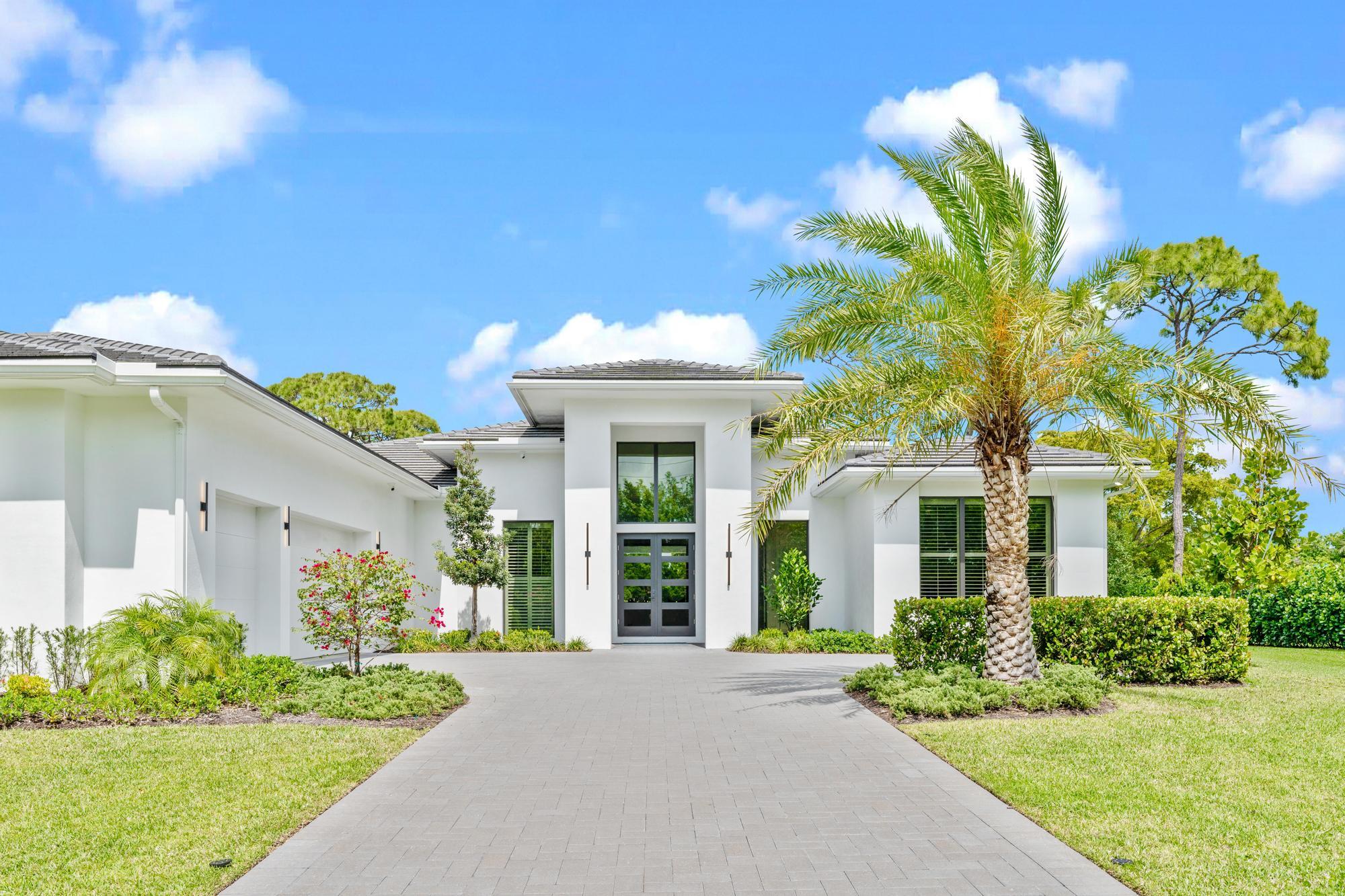 Built in 2023, this 5-bedroom, 5.1-bath custom estate sits on a 1+ acre corner lot in the gated luxury community of Steeplechase. The open floor plan features 10-foot sliding doors leading to a backyard with a heated saltwater pool, jacuzzi, summer kitchen, and cabana bath. The primary suite offers backyard views, his-and-hers walk-in closets, and dual bathrooms with a freestanding tub and spa shower. A 6th bonus room provides flexibility for a gym, office, or playroom. The chef's kitchen is equipped with European-designed GOLA cabinetry, a Wolf induction cooktop, double ovens, Sub-Zero refrigeration, and a walk-in pantry.

Recent upgrades include a commercial-grade Generac generator, expanded propane tank capacity (500 gallons), an A/C unit for the 3-car garage, upgraded master closets window treatments with remote shades, a PCO air purification system, enhanced Ethernet wiring, and a full-home security system. Steeplechase offers privacy with two manned gated entrances, tree-lined streets, and estate homes on large lots. Centrally located in Palm Beach Gardens, it's just 15 minutes from Jupiter, West Palm Beach, Palm Beach, PBI Airport, and the beach, with low HOA fees and no mandatory membership costs.