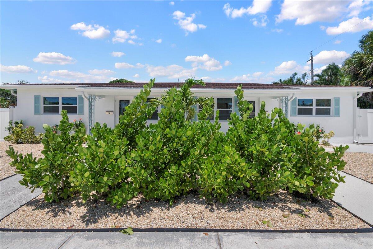 Beautifully renovated duplex in the heart of West Palm Beach, just minutes from PBI Airport and vibrant Downtown WPB. This turnkey 2 unit property blends modern upgrades with relaxed coastal charm, making it ideal for investors, multi generational living, or an owner occupant seeking additional income. Step outside to a fully fenced private backyard oasis featuring lush turf, a spacious gazebo, and a soothing hot tub—perfect for entertaining, relaxing, or offering guests a true Florida retreat. The outdoor space is low maintenance and designed for year round enjoyment. All Pre-Approvals need to go through Francesca Anello, who is a fully licensed loan originator in the State of Florida. Buyer can ultimately use the lender of their choice. Call listing agent for Francesca's information.