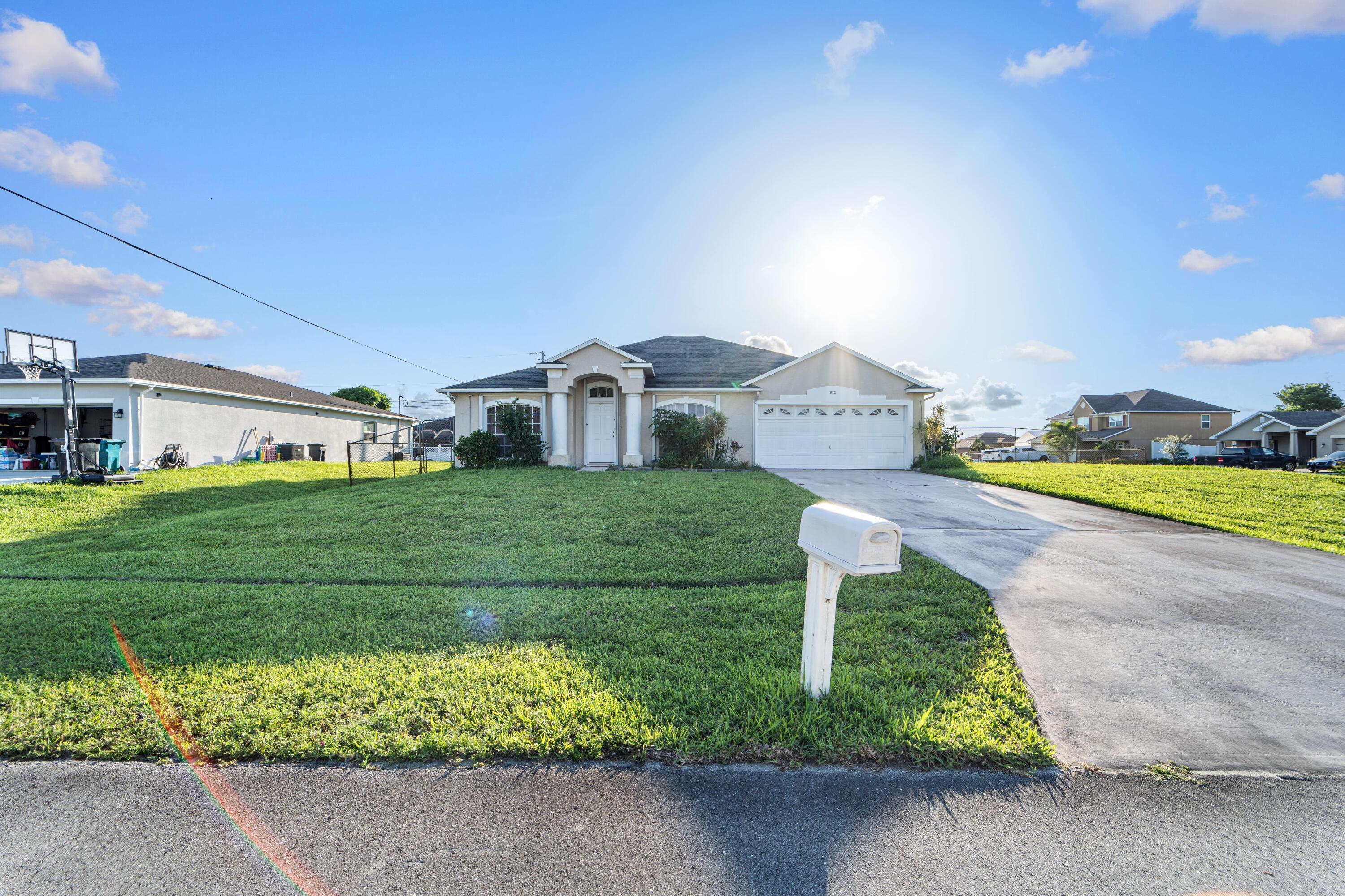 BACK ON THE MARKET DUE TO FAILED SELLER CONTINGENCY Welcome to 672 SW Kayak Avenue — a spacious and well-maintained 3-bedroom, 2-bathroom single-family home located in the heart of Port St. Lucie.  Step inside to discover an open-concept layout with vaulted ceilings, abundant natural light, and over 1,800 square feet of living space. Enjoy quiet evenings in the large primary suite, complete with a walk-in closet and en-suite bath with dual sinks and a soaking tub. Two additional bedrooms offer plenty of space for guests, or a home office. Located just minutes from shopping, dining, parks, I-95, and the Florida Turnpike, this move-in ready home is the perfect blend of location and lifestyle.