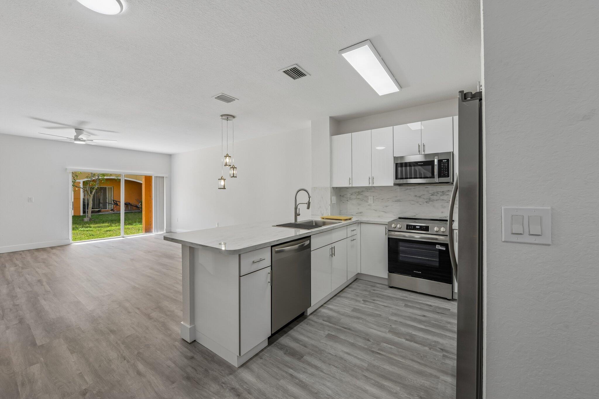 Fully renovated and completely move-in ready! Rarely available in Monte Carlo, this beautifully updated true 3-bedroom, 2.5-bath townhome has been transformed with a brand-new kitchen, remodeled bathrooms, new flooring throughout, fresh paint, updated lighting, stainless steel appliances, new washer and dryer, and an epoxy-coated garage floor! Every detail has been thoughtfully selected to create a modern, turnkey home! Enjoy spacious living areas, a functional two-story floor plan, and the peace of mind that comes with extensive recent upgrades. If you've been waiting for a home where all the work has already been done, this is it!!