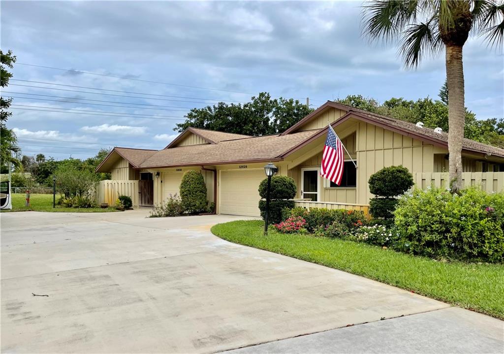 Fabulous Location ! Tucked into a quiet cul-de-sac on a corner lot with Beautiful Golf Course views in the much desired 55+ Community of EAGLEWOOD GOLF & TENNIS CLUB. This well maintained Villa boasts Master w/ attached screened porch, Large Living & Dining Room, add'l. Florida Room & spacious Galley Kitchen. 2 Private baths, 7 Ceiling Fans, Built in safe & golf cart are included. One time Capital fee contribution of $3,000 includes an updated clubhouse with  dining room, library, card room and Golf pro shop. HOA fee includes Unlimited GOLF, homeowners insurance, putting & chipping green, tennis, bocce, pickleball, large heated pool, hot tub, newly renovated clubhouse, library, workshop, & dog park.  Minutes from shopping, restaurants, hospitals, beaches & airport.Great place to live!