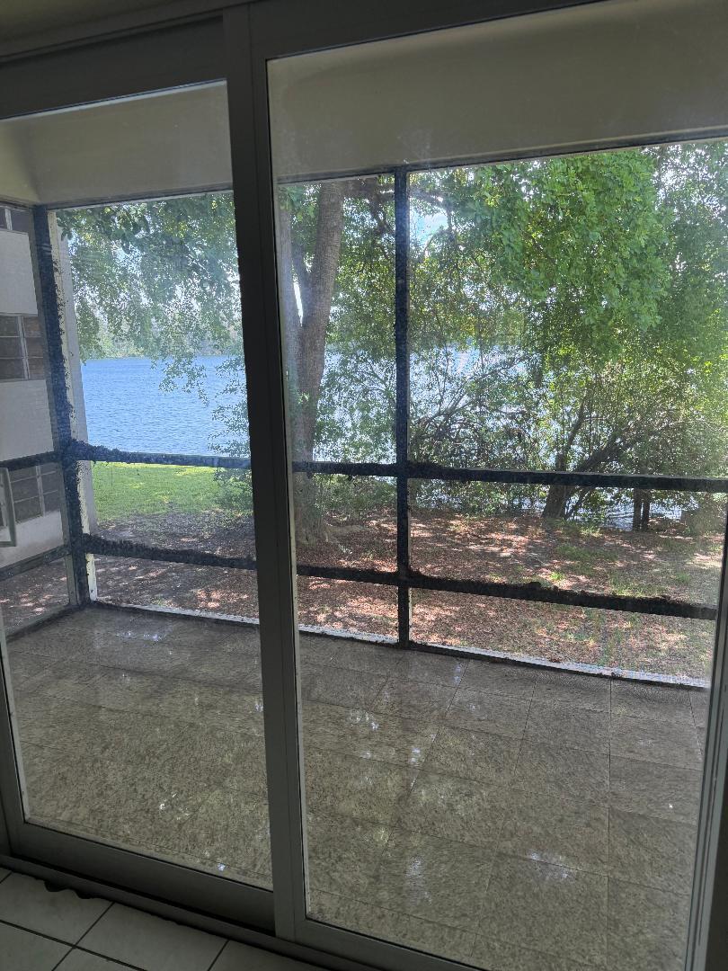 REMODELED 2ND FLOOR CORNER (WALK-UP) UNIT IN A SMALL BUILDING WITH SCREENED BALCONY OVERLOOKING CRYSTAL LAKE! SHOWS VERY WELL WITH UPDATED KITCHEN AND BATH, CONVENIENT LOCATION, READY FOR OCCUPANCY AND FAST APPROVAL!
