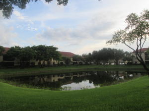 *Relocation pushes the Sale* Unfurnished  unit $189K - furnished $195K*Recently painted and re-carpeted* Brand new fixtures and furniture as well* This Unit Has ALL- It has private Elevator, it's corner, has a Lake view from All rooms and screened porch for relaxation *It's the largest model in Platina offering 3 bedrooms and 2 baths -  1,657sf living area*The spacious first floor private entry has a private Elevator and wide staircase to the 2 floor*Vaulted ceilings*Clubhouse has a Cafe and is exceptionally active with a fitness center, pool, library, game rooms, shuffleboard, tennis courts and numerous satellite pools throughout the community* Centrally located in Platina just west of Military Trail on Boynton Beach Blvd,this community has easy access to both I-95 and the Florida Turnpik
