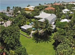 Outstanding Balinesian inspired estate with over an acre of land. Unbelievable outdoor entertainment area. Completely fenced in with great privacy. Full house generator, elevator and guest house are just a few of the amenities offered. 150 ft of private beach front is included in this sale. Both Deeds will transfer at time of closing.The information herein is deemed reliable and subject to errors, omissions or changes without notice.  The information has been derived from architectural plans or county records. Buyer should verify all measurements.Furniture for staging purposes only and is not for sale.***SEE SUPPLEMENT*** As exotically alluring as a South Seas island resort, this idyllic Ocean Ridge estate is secluded on 1.26Â± acres of gated, walled and fenced grounds just steps from the Atlantic Ocean, where it features its own 150Â±-foot stretch of blissful sandy beachfront.  Majestic palm trees sway gently in the ocean breeze on the sprawling lawns that surround this Balinese-inspired residence designed by architect Borglund Associates, LLC and custom built in 2008 by Roger Thomas Construction.

Casually elegant living is at home in this creatively designed six-bedroom residence arranged in light and airy wings, all of which open to the breezy lanais and terraces of the ultimate outdoor entertainment space featuring a cabana pavilion by the waterfall pool.  Capturing the lush landscape vista from the second floor, served by an elevator, the main living areas center on a cathedral-ceilinged open great room infused with a relaxed tropical feel.  Opening out to a lanai right by the pool, the large master suite creates a romantically elegant retreat including a spa-like bath.  Secluded on the west side of the property, the separate self-contained guest house completes this ultra-luxurious compound-like estate, a true paradise by the sea.

Location
Beachway North, a private road in Ocean Ridge, Florida.  One of the Gold Coast's best-kept secrets, the exclusive hamlet of Ocean Ridge is prized for its tranquility, relaxed ambiance, and unspoiled barrier island beauty nestled between the Atlantic Ocean and Intracoastal Waterway.  Ocean Ridge is conveniently located within easy driving distance of Delray Beach, Boca Raton, and Palm Beach, all offering fine shopping, dining, and entertainment.  Palm Beach International Airport is just a 20Â±-minute drive from Ocean Ridge.

Property
On expansive 1.26Â±-acre grounds, this walled and fenced estate is situated on a cul-de-sac just one property in from the Atlantic Ocean, where it features 150Â± feet of private sugar-sand beachfront, included in this offering.  Approached by a sweeping, gated motor court, the Balinese-inspired residence is surrounded by verdant lawns with stately palm trees and other lush tropical foliage.  Wraparound lanais open from both levels of the residence, leading to the resort-style saltwater pool with waterfall spa and wading area â€" all on a beautifully landscaped coral-stone terrace.  This spectacular outdoor entertainment space is served by a large pavilion with fully equipped summer kitchen, cabana bath, and outdoor shower.

Residence
Flowing in spacious, airy wings, this well laid-out residence totals 10,433Â± square feet with six bedrooms, six full and two half baths â€" including the separate guest house â€" plus attached/detached garages with three bays.  Special amenities include the elevator, whole-house generator, two tankless hot water heaters, and central vacuum system.  High ceilings carry throughout, with floors finished in hand-honed walnut and Saturnia marble.  All windows and exterior doors have PGT impact glass, some also with plantation shutters.  Interior doors are custom crafted of mahogany. Exterior finishes include high-grade metal roofing and ipe-wood lanais with cypress ceilings.

Main Level:  Entered from the ground-floor foyer with staircase and elevator, the magnificent open great room is appointed with a beamed cathedral ceiling, wide-plank walnut floors, and wraparound sliding glass doors that flow to a breezy lanai looking out over the pool patio and lush grounds.  Adding the room's finishing touches are the inviting coral-stone fireplace, built-in bookcases, and intricate hand-carved pillars imported from India.  Separated by an island with bar counter, the open chef's kitchen includes custom cabinetry, Caesarstone counters, a six-burner gas range, and Sub-Zero refrigerator/freezer plus a wine cooler.  The large butler's pantry can also function as a catering kitchen.  Off the main kitchen, the bright open dining/family room is highlighted by a beamed cathedral ceiling and flows through glass walls to the wraparound lanai.  Offering flexibility for use as a bedroom, the private library/office opens to an oceanview balcony, and includes a loft and an en-suite bath.

Ground Level:  Opening to a wraparound lanai by the pool patio, the spacious master suite has beautiful walnut, Saturnia marble, and porcelain finishes, and includes a sitting area by the elevated sleeping area.  Adjoining the generous wardrobe room, the luxe spa-like master bath features a Sicus glass mosaic-inlaid marble floor, steam shower, step-up tub, and tigerwood cabinetry with dual sinks. Adjacent is the fabulous fully equipped fitness room, which also opens to the poolside lanai and has a rubber floor as well as a large-screen television.  Three more bedrooms all have en-suite bath and private outside entries.  The laundry room is also located on this level.

Guest House:  Placed above the detached garage, with separate outside entry, the private guest quarters are complete with a kitchenette, full bath, and laundry area.

Disclaimer: The information provided herein including but not limited to measurements, square footages, lot sizes, calculations and statistics have been obtained and conveyed from third parties such as the applicable Multiple Listing Service, public records as well as other sources. All information including that produced by the Sellers or Listing Company are subject to errors, omissions or changes without notice and should be independently verified by any prospect for the purchase of a Property.  The Sellers and Listing Company expressly disclaim any warranty or representation regarding all enclosed information.  Prospects' use of any information herein is acknowledgement of this disclaimer and that Prospect shall perform their own due diligence.  Prospects shall not rely on this information when entering into a contract for sale and purchase.  Some affiliations may not be applicable to certain geographic areas. If your property is currently listed, please do not consider this a solicitation.   In the event a Buyer defaults, no commission will be paid to either Broker on the Deposits retained by the Seller. "No Commissions Paid until Title Passes."    Buyer pays title insurance, Florida documentary stamps, and all other closing costs for New Construction and land use. Copyright 2016 Listing Company.  All Rights Reserved.