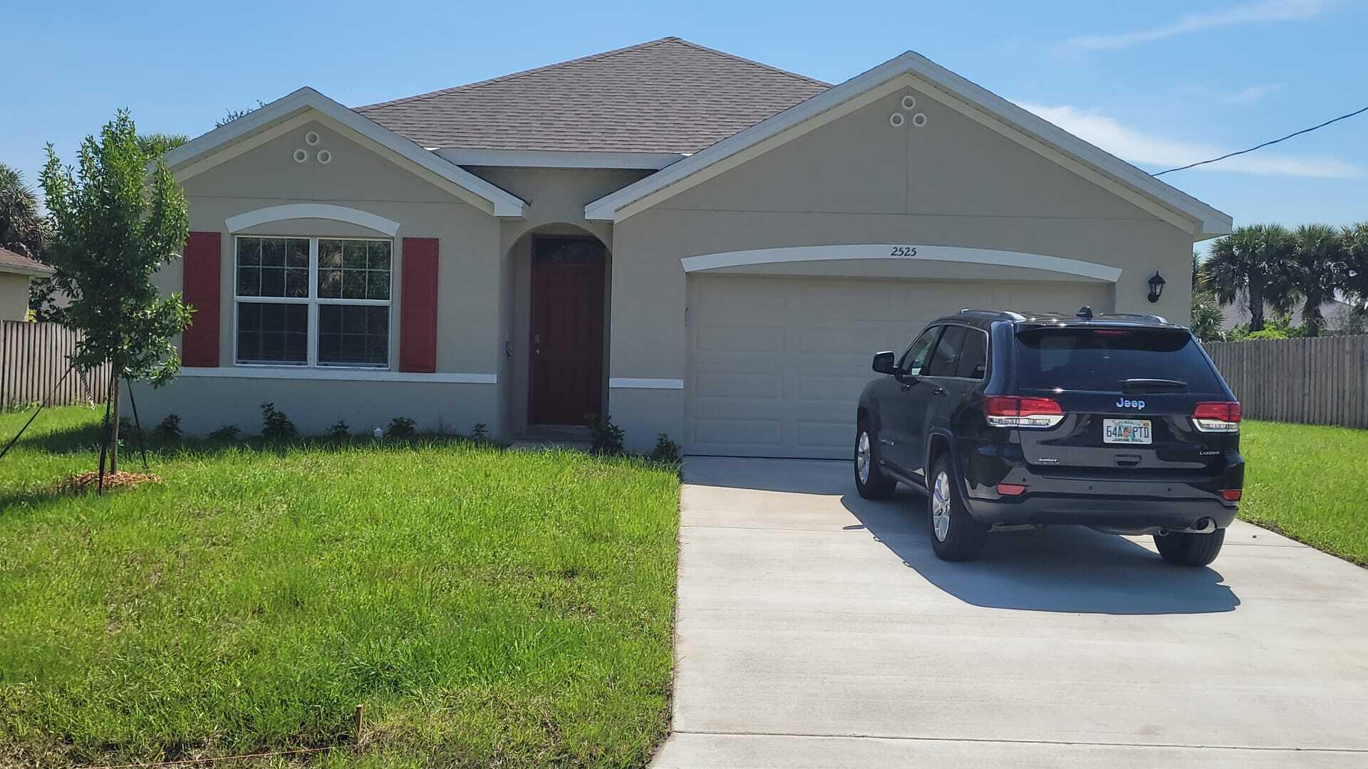 Beautiful, Like-New Home in Port St. Lucie  Move into this beautiful, like-new 4-bedroom, 2-bathroom home in a prime Port St. Lucie location. The home features no carpet, modern flooring throughout, and a bright, open floor plan.  Enjoy a huge backyard, perfect for relaxing or entertaining. The property includes a 2-car attached garage plus a large driveway with space for 4-6 additional vehicles.  No HOA approval required, making the move-in process easier and faster. Conveniently located near shopping centers, restaurants, parks, schools, and major highways, this well-maintained home offers comfort, convenience, and an outstanding location.  Available for immediate occupancy. Schedule your private showing today! Like-new 4-bedroom, 2-bath home with no carpet, modern flooring throughout, and a spacious backyard. Features a 2-car garage, oversized driveway with parking for 4-6 additional vehicles, and no HOA approval required. Prime Port St. Lucie location close to shopping, schools, parks, restaurants, and major highways.