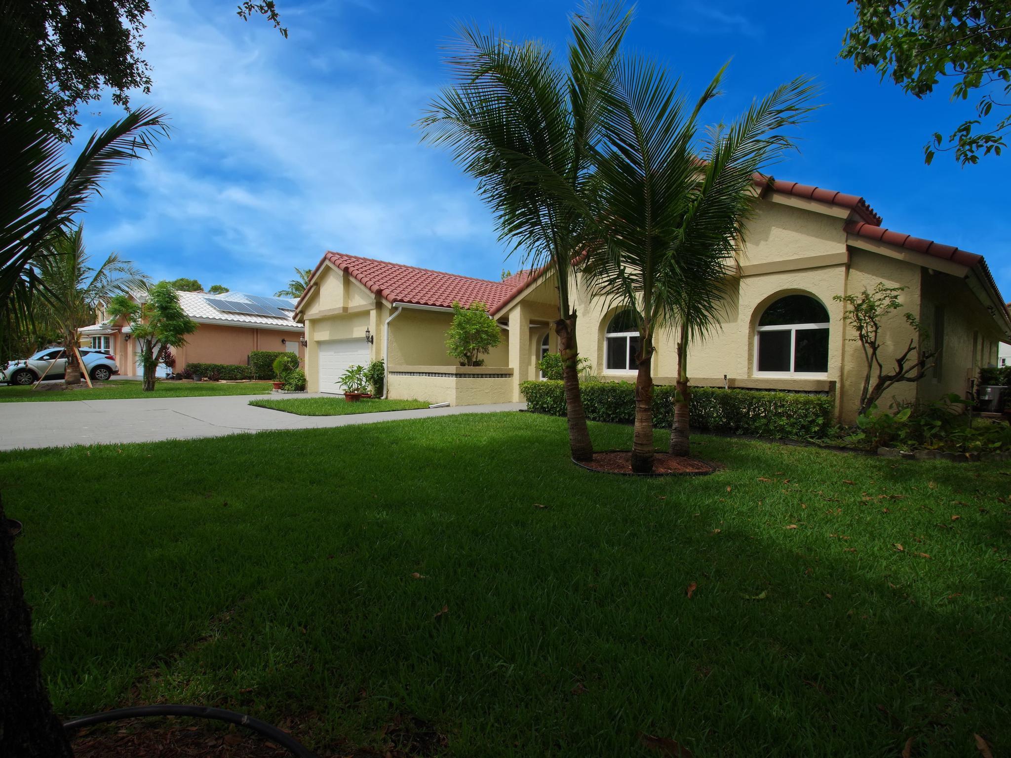Welcome to this beautifully maintained custom-built 4-bedroom,3-bath, ranch home in one of Parkland's most sought-after gated community of Country Point Estates, situated on an oversized, private 15590 sq ft cul-de-sac corner lot, outdoor oasis features a sparkling pool, lush tropical landscaping, mature, rare fruit trees (mango,sapota,sugar-apple, strawberry-guava and more) Inside soaring celings,bright skylights, and a seamless open-concept floor plan create an inviting atmosphere. Spacious primary suite and secondary bedrooms all feature generous walk-in-closet, meticulously cared for by its original owners, Updates include full Hurricane impact windows, doors and garage door all in 2017.  New roof in 2015, New dual-zone A/C system replaced in 2020(both air handlers and condensers) Additional highlights 2 car garage with an extended driveway fitting up to six cars. Remarkably low Hoa fees, and access to parklands top-ter A-rated schools .