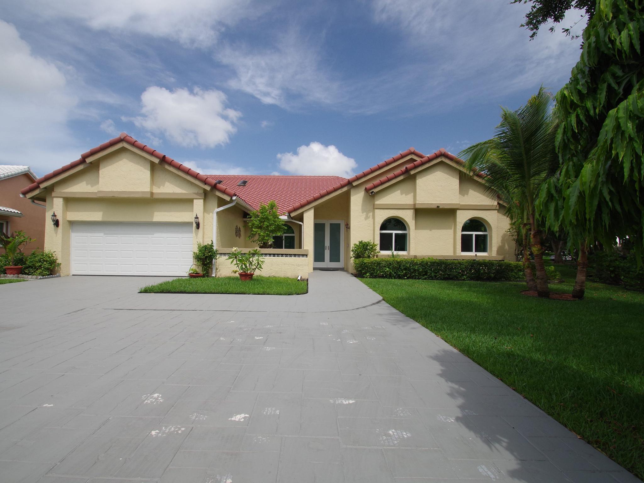 Welcome to this amazing opportunity to own this beautifully remodeled 4 bedroom,3-bath, one story pool home in Parkland, ideally located in the gated community of County Point Estates, A-rated schools,  high ceilings, Sun light, Formal dining area, bright and open living and family area, updated island kitchen overlooking pool, all 4 bedroom has walk-in-closet, Perfectly positioned on a 15590 sq ft corner cul-de-sac lot  with tropical plants and rare fruit trees, All windows and doors hurricane impact proof installed in 2017, garage door installed 2017, Roof replaced in 2015, 2 zone A/C units( Air handler and Condenser) replaced in 2017 ,2 car garage and elongated  6 car driveway, all complimented by low HOA fees , Close to sawgrass express way & turn pike