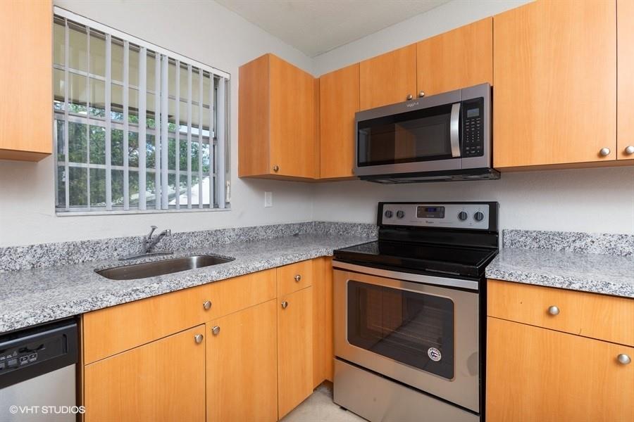 TERRIFIC Opportunity at Townhouses of Plantation. UPGRADED Top Floor Condo unit. Features NEW AIR-CONDITIONING. NEW ELECTRICAL PANEL. NEW STAINLESS-STEEL APPLIANCES. New GRANITE Counters in the Kitchen. New Water Heater. New Carpeting in Bedroom. New Light Fixtures. Newly Painted. Updated Bathroom with New Granite Top Vanity, Mirror & Fixtures. Shows Extremely Well. Amenities incl: swimming pool, tot lot & laundry facilities. Pet Friendly. All Ages. Move In Ready!! First Time Buyers complete HomePath Ready Buyer homeownership course & earn closing cost assistance. This is a Fannie Mae Homepath Property!