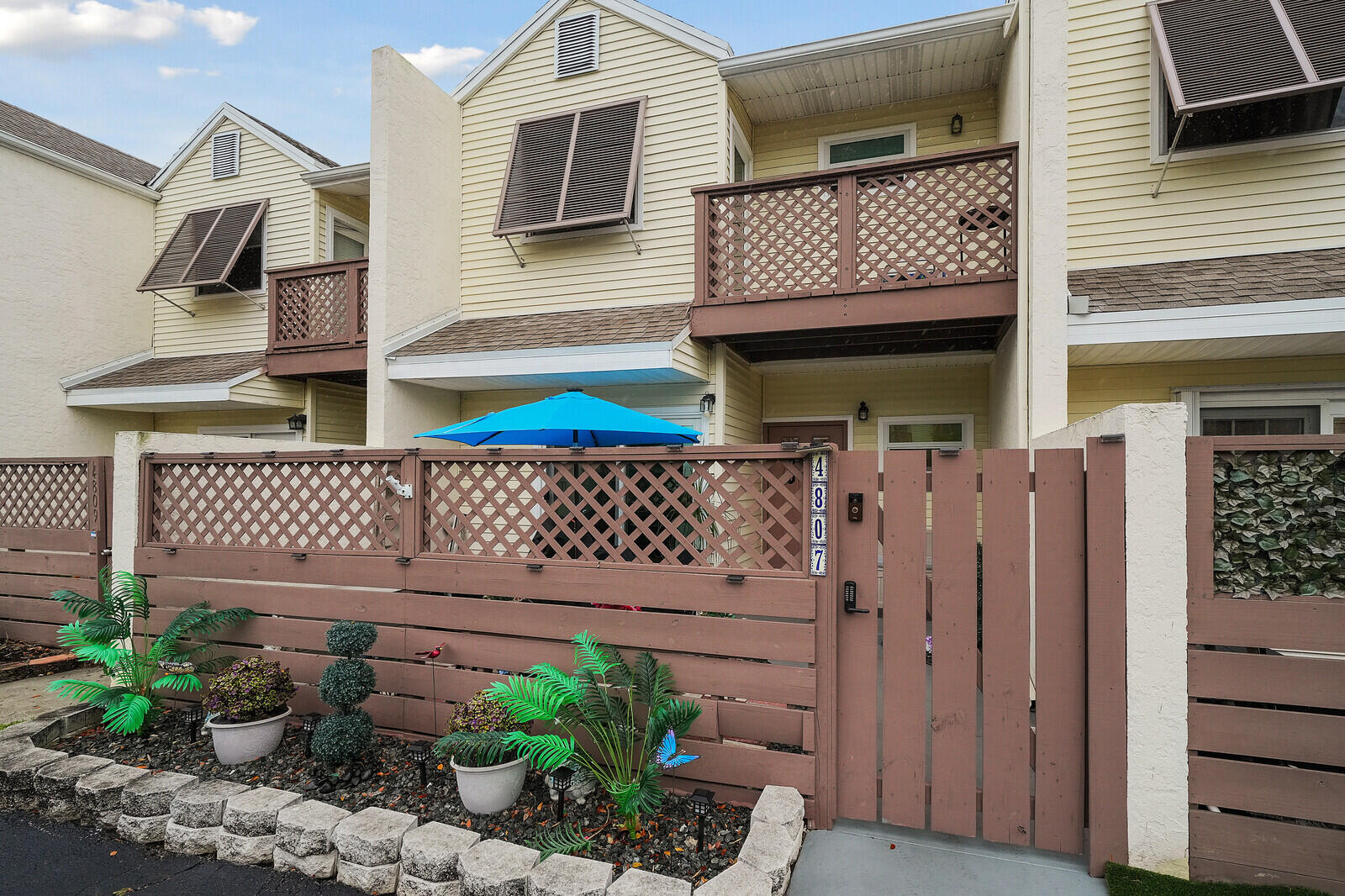 Welcome to this beautifully maintained two-story townhouse in Margate, offering the perfect blend of comfort and functionality. This 2-bedroom, 2.5-bath home features a spacious layout with an additional den complete with a closet—ideal for use as a third bedroom, home office, or guest space.  The home has been fully renovated with tile floors throughout. Enjoy a bright eat-in kitchen with stainless steel appliances, and in-unit laundry for added convenience.  Step outside to relax on either the front or back patio, with the rear patio offering a peaceful canal view—perfect for morning coffee or evening unwinding. Two dedicated parking spots are located directly in front of the home for added ease. Residents enjoy access to a variety of community amenities, including a pool, hot tub, sauna, racquetball courts, and a fully equipped fitness center.  A fantastic opportunity for comfortable living in a desirable location!