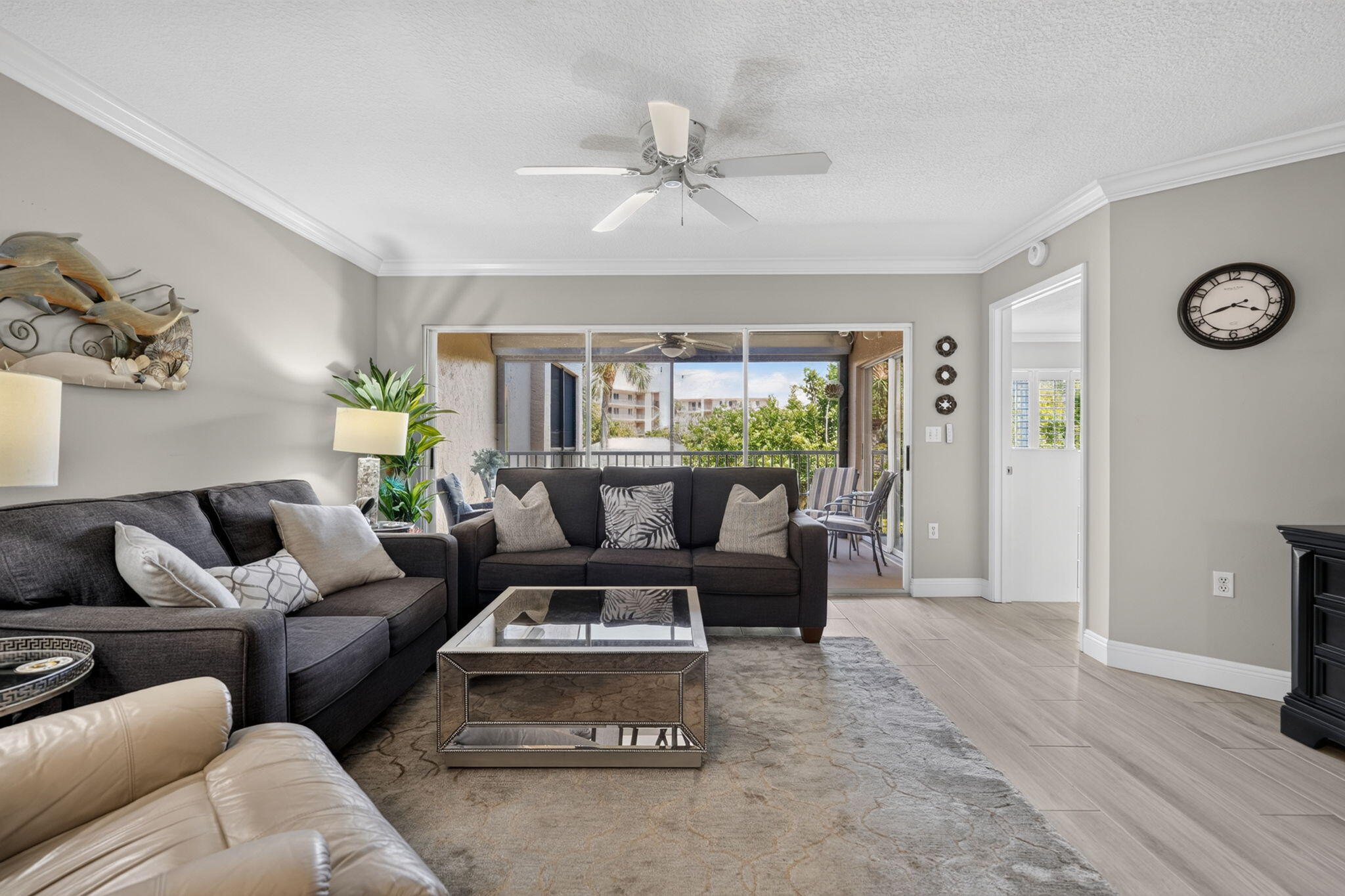 Enjoy the best of Jupiter living from this beautifully updated 2nd floor condo with elevator access on the top floor of the building. Just a short walk to Jupiter Beach, this inviting condo features an updated kitchen and bathrooms and a spacious screened, covered patio overlooking the community pool. The primary bedroom offers a king size bed, while the second bedroom is currently configured as a home office or den with a Murphy bed for guests. Enjoy being within walking distance to the beach, waterfront restaurants, shopping, Harbourside, Riverwalk, and many of Jupiter's favorite dining and entertainment destinations. Resort style living in one of Jupiter's most desirable locations.