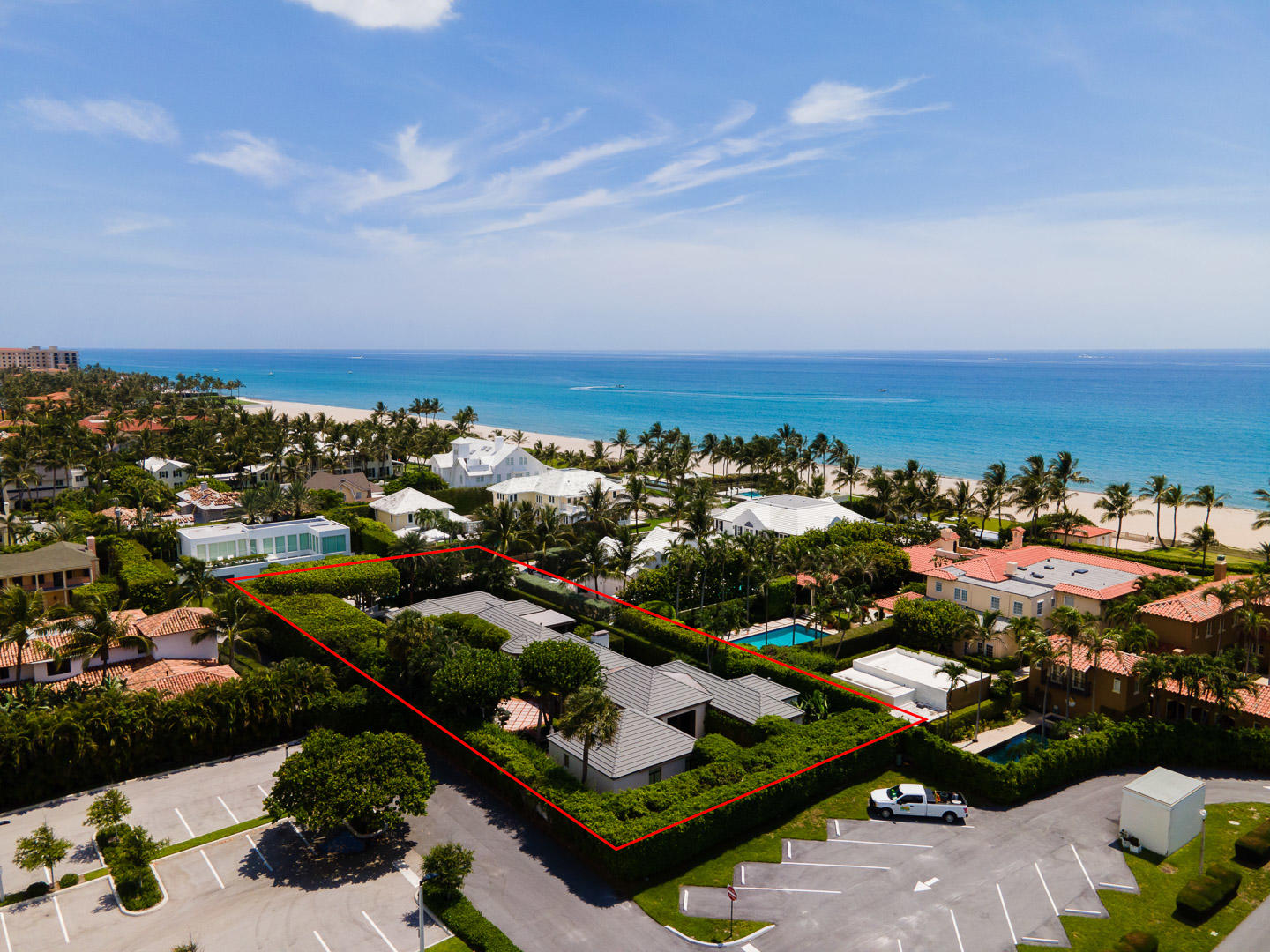 Spectacular 4BR/4.1BA estate with 5,351+/- total square feet on the Ocean Block of Seaview Avenue, just one house from the beach. Features formal dining room, gourmet eat-in kitchen with top-of-the-line appliances, and beautiful gallery lined with floor to ceiling windows. Light and bright interior loggia opens to large pool. Fantastic outdoor spaces with welcoming motorcourt, covered and open loggias, and summer kitchen with built-in grill. Situated on oversized In-Town lot, this home is minutes from Worth Avenue's renowned shopping and restaurants.