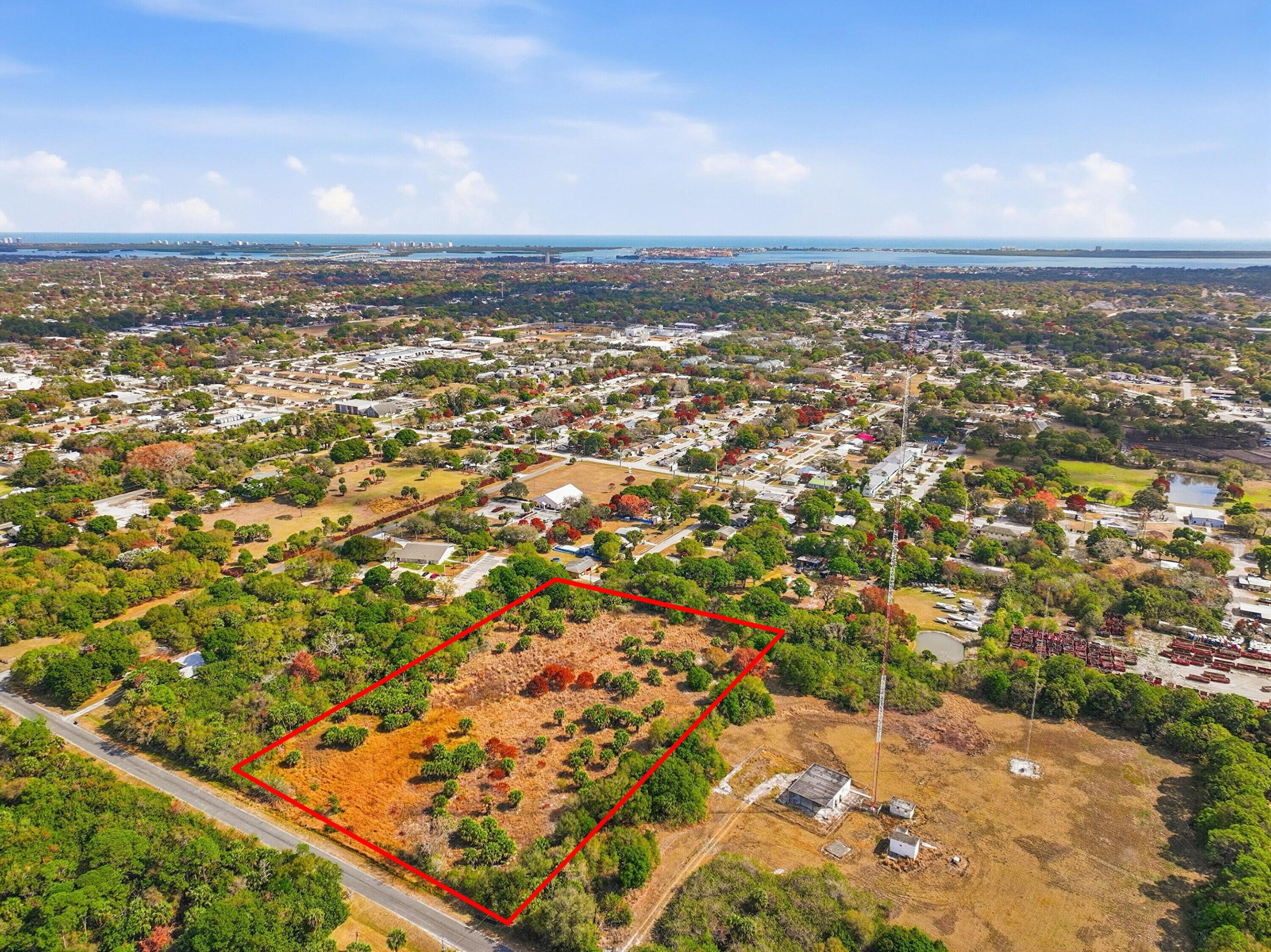 Prime 5.28± acre infill development opportunity in the City of Fort Pierce, positioned for multifamily or rental housing with Residential Low-Density (RL) Future Land Use supporting approximately 31 units. Current E-3 zoning allows ~15 units by right, creating a compelling rezoning pathway to align with FLU and maximize density. Centrally located near major employment hubs including Lawnwood Regional Medical Center and Indian River State College, the site is well-situated for workforce housing, townhome development, or build-to-rent communities.

READ MORE BELOW. Fort Pierce is undergoing significant transformation driven by major public and private investment. The planned King's Landing mixed-use redevelopment is a $155M project that will introduce hospitality, residential, retail, and dining along the waterfront, reinforcing downtown as a regional destination. Ongoing Downtown and Marina Square revitalization efforts continue to enhance connectivity, public spaces, and waterfront activation. The proposed Koa Bay surf park and lifestyle development is a $650M project expected to deliver a large-scale mixed-use environment featuring residential, hospitality, and recreation, further elevating the city's profile as a tourism and lifestyle hub.

In addition to destination projects, Fort Pierce's economic base continues to expand with the Derecktor Fort Pierce superyacht refit facility at the Port, establishing the area as a premier marine service hub and generating sustained demand for workforce and rental housing. Proximity to major employment centers including Lawnwood Regional Medical Center and Indian River State College further strengthens long-term housing demand fundamentals.

Strategically positioned near major corridors with convenient access to Downtown Fort Pierce, the waterfront, and regional transportation routes, this parcel offers developers the opportunity to capitalize on a growing market supported by infrastructure investment, job creation, and destination-driven growth.