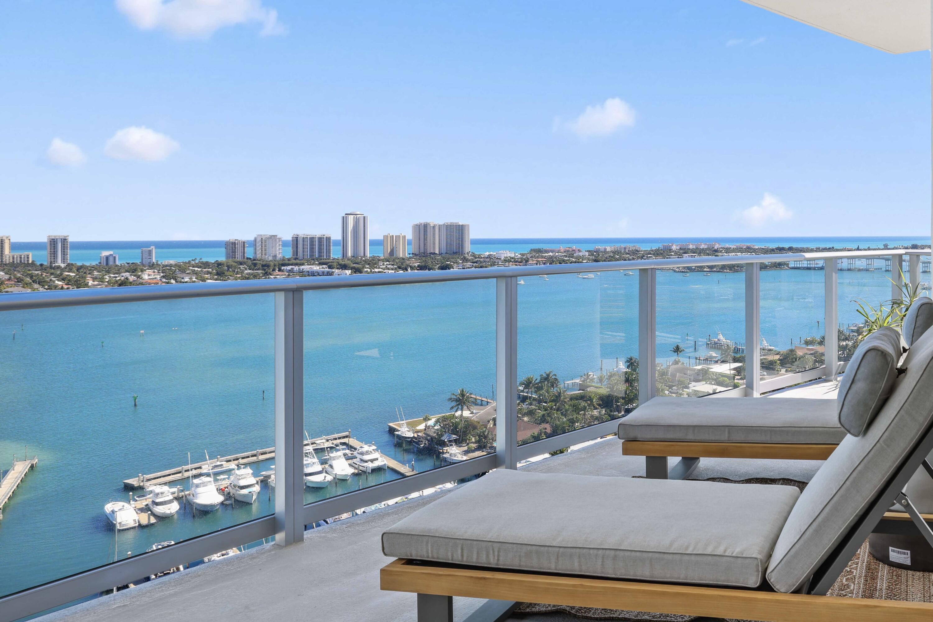 BRAND NEW - DIRECT WATERFRONT - ONE OF A KIND!! Located on the coveted SE CORNER, This residence is the epitome of South Florida Living. 10' Floor-to-ceiling windows frame stunning water views, bringing in natural light from every direction. Professionally decorated to the highest standards, complete with 3-beds, 3.5-baths, plus a den, hurricane-impact glass, Miele appliances, a wine cooler, European cabinetry, and a waterfall quartz island & private elevator lobby. The primary suite offers stunning water views, spacious walk-in closets, and a spa-style bath with dual sinks. The well-proportioned flow through floor plan is ideal for everyday living and entertaining. The spacious, wraparound terrace invites seamless indoor-outdoor living.  Indulge in waterfront dining at SeaHawk Prime by David Burke. Residents enjoy unparalleled amenities across a one-acre amenity deck, including a resort-style pool and spa, a rooftop lap pool and spa, fire pits, putting green, yoga deck, dog park, club room, cinema, golf simulator, guest suites, valet service, and 24-hour concierge. Indoor amenities include spin and yoga studios, sauna and steam rooms, bowling alley, theater, music studio, billiards and card rooms, kids' playroom, and teen gaming lounge. Pet-friendly. Lobby and amenities designed by Interiors by Steven G.