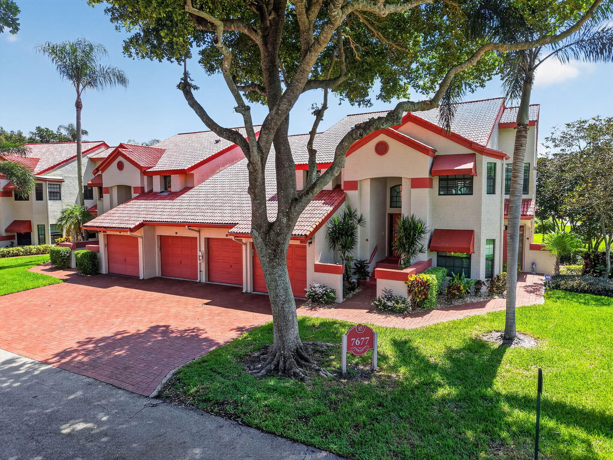 Step into this lovely, fully renovated ground-floor 2-bedroom, 2-bath residence in the highly sought-after Lexington Club of Delray Beach. Every detail has been thoughtfully updated, featuring a brand-new kitchen with custom-built island and all-new appliances. The spacious layout offers beautifully remodeled bathrooms, generous walk-in closets, and the convenience of an interior laundry and dedicated storage area. Features include impact windows replaced in 2024 and a plexiglass-enclosed lanai, providing added storm protection, comfort, and year-round enjoyment of the outdoor living space.  Enjoy an active, resort-style lifestyle in a beautifully maintained community featuring a newly updated clubhouse, climate controlled pool and outdoor spa, tennis and pickleball courts, shuffleboard, and more. Ideally located just minutes from Delray Marketplace and vibrant Downtown Atlantic Avenue, offering endless dining, shopping, and entertainment options. HOA includes Roof maintenance and Insurance, Water, Cable, Pest Control and Landscaping for added convenience and peace of mind. Don't miss