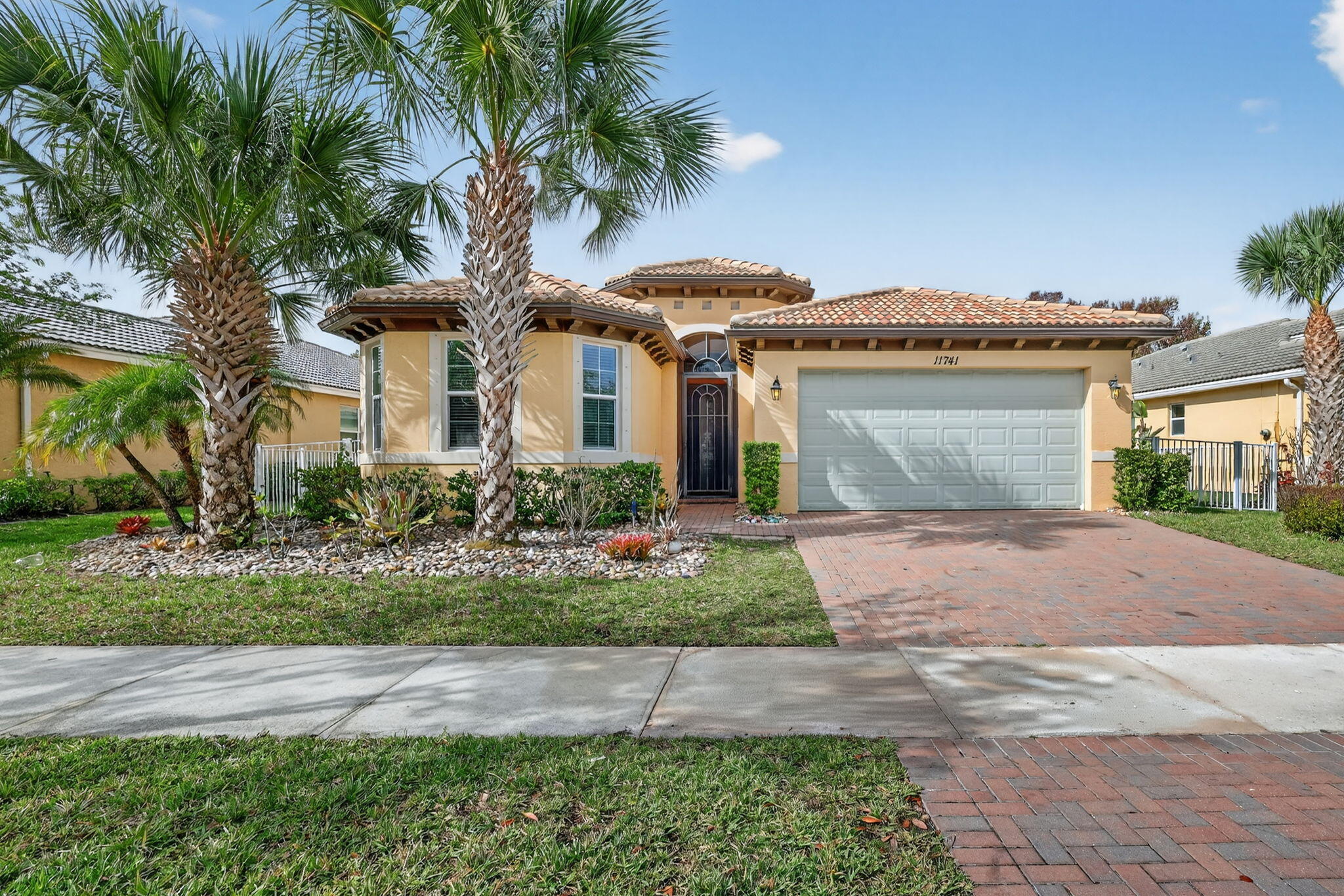 Welcome to resort style living at its finest. This beautiful 3BR + Den, 2.5 BA built in 2014 features large eat-in kitchen, granite countertops, stainless steel appliances, and plenty of counterspace. Integrated family room and a separate formal dining room makes this home perfect for entertaining and family living. Enjoy all the amenities in the family friendly community of Town Park, featuring a giant swimming pool, splash pad and park, as well as a full gym, basketball and tennis courts, and so much more. Minutes away from restaurants and shopping in downtown Tradition. Schedule your showing today.
