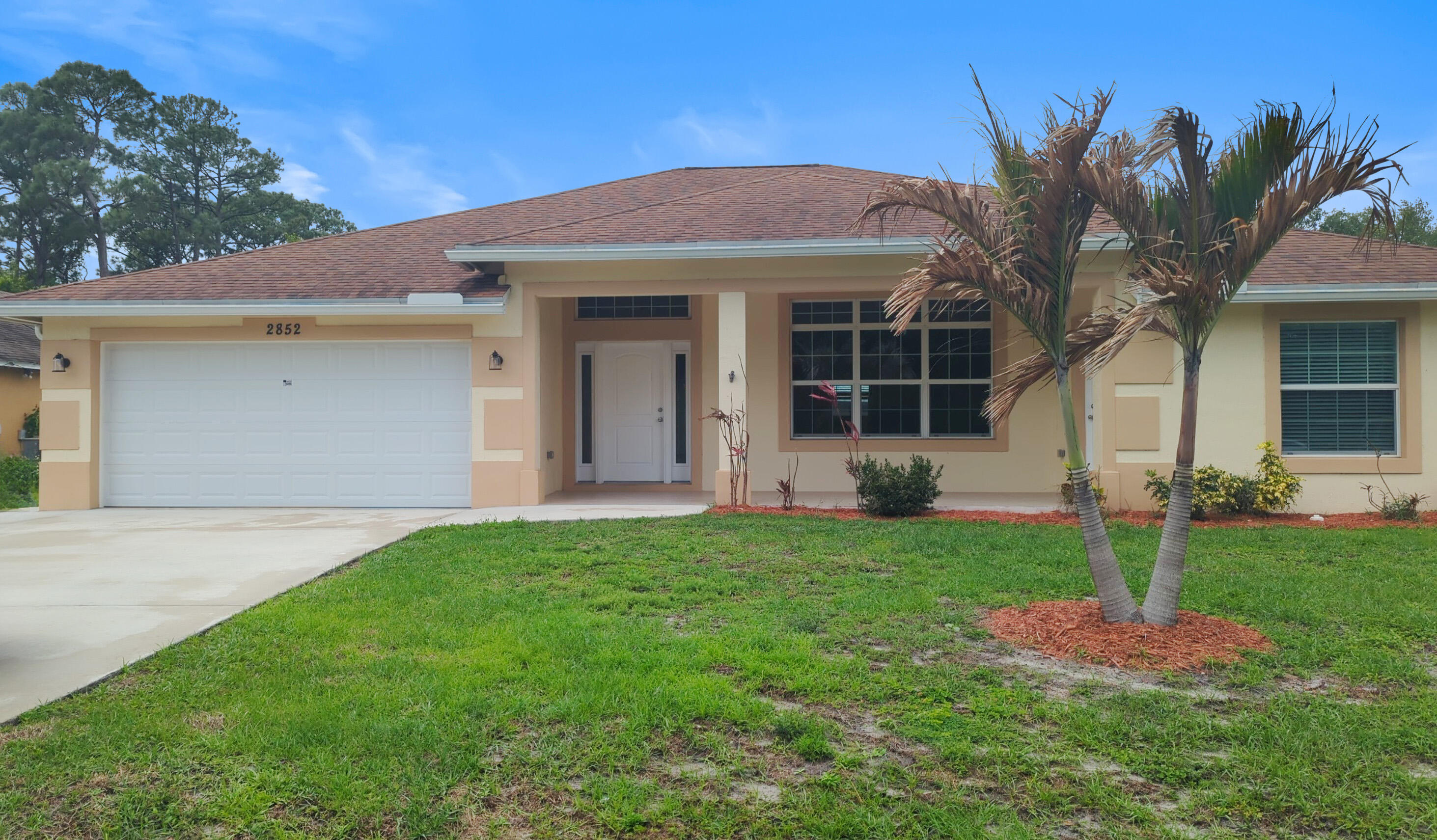 Modern Luxury 4/3.5/2 with a Pool, In-Law Suite & Spa!! CBS construction, 2223 SF, built in 2021. Enjoy the large fenced yard, Saltwater Pool with waterfalls, separate  hot tub, covered patio, outdoor shower and cabana bath without the need to step inside the main house. NO HOA. The oversized lot gives you room for your all your toys!. Inside, find a beautiful kitchen with quartzite counters, stainless steel appliances, farm sink and tile backsplash. The open layout features luxury vinyl/tile floors, and beautifully detailed tray ceilings. This home features a private in-law suite with separate entrance, dual walk-in closets in master, and shaded patios front and back. A true Florida retreat awaits. This is a FannieMae Homepath property.